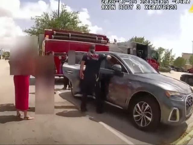 <p>Footage from a Hollywood Police Officer bodycam in Hollywood, Florida, shows local fire crews rescuing a child that had been locked in a hot car while her mother, Anastasiya Motalava, was shopping in a nearby Walmart</p>