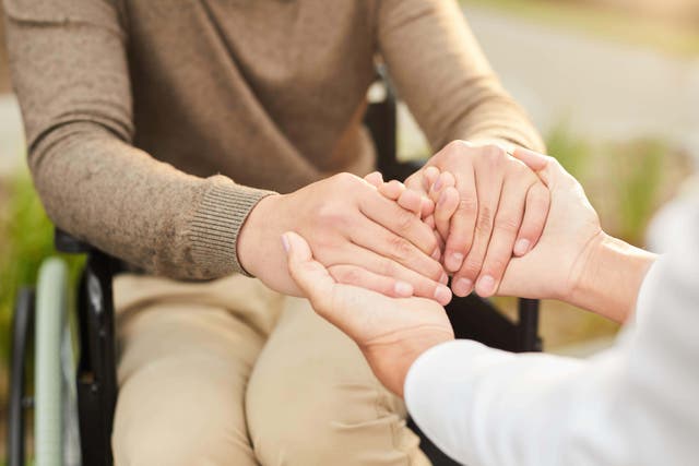 Councils have called for a delay to the ‘unfunded’ cap on personal care due to come in next year (Alamy/PA)