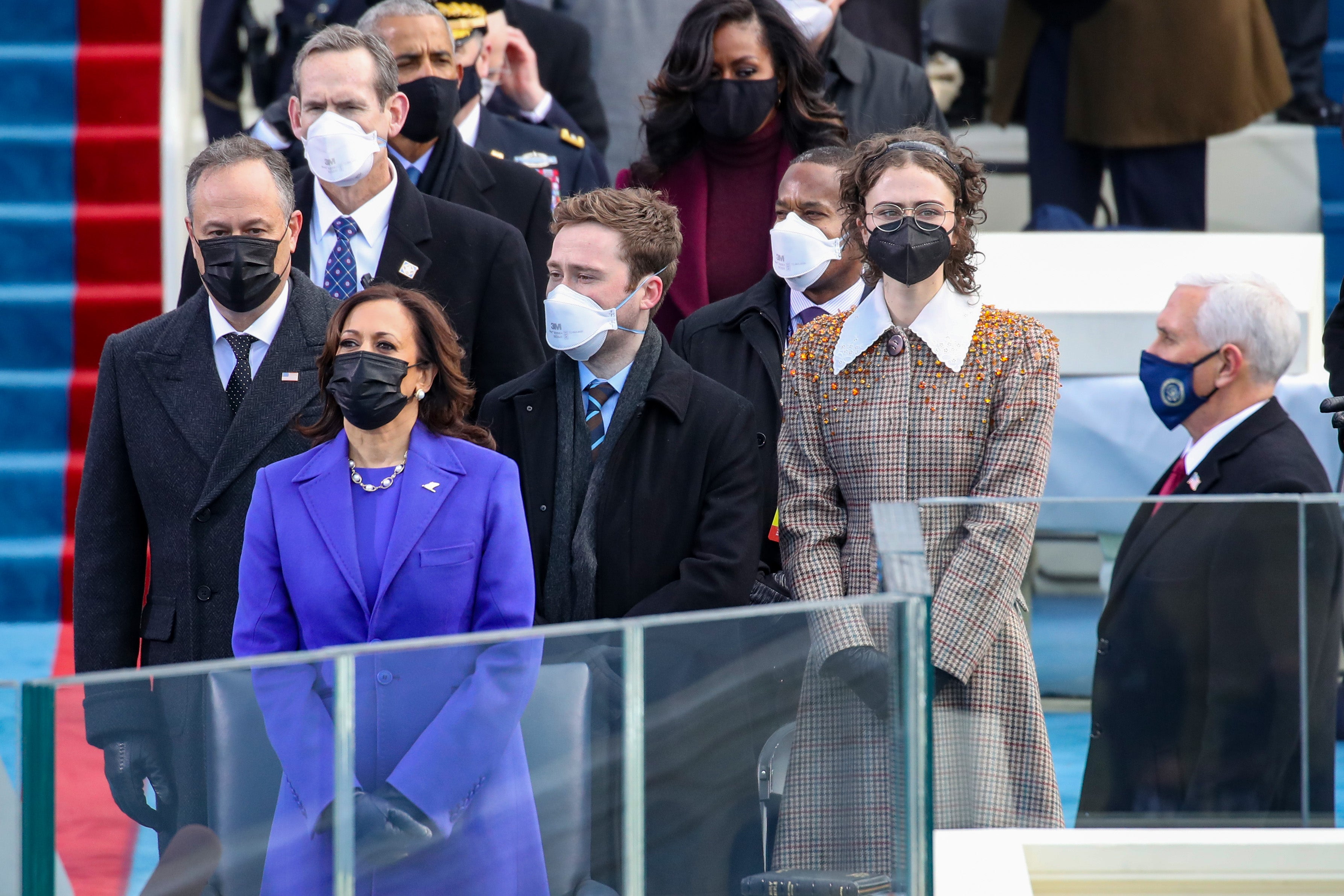 Cole and Ella standing next to their father and “Momala” during the inauguration on January 20, 2021