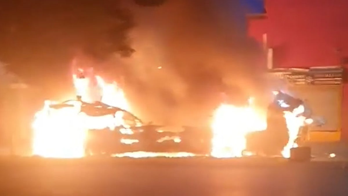 Flames engulf double-decker bus after riot breaks out in Leeds with  hundreds on streets