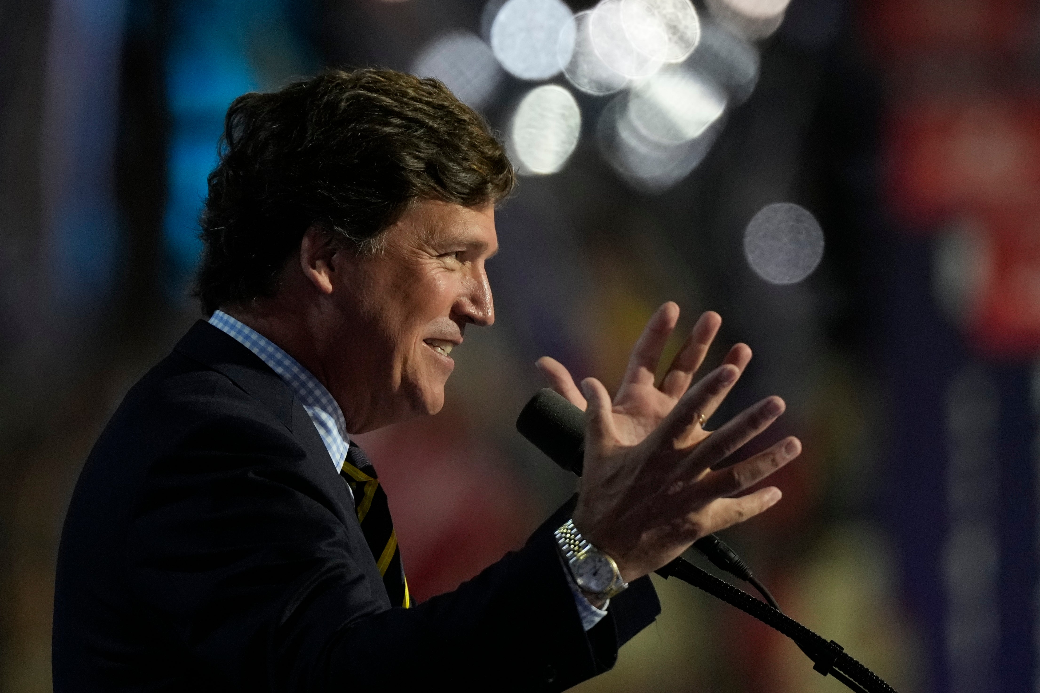 Tucker Carlson, pictured speaking last month at the Republican National Convention, teased an upcoming documentary on Donald Trump’s ‘comeback’ nearly one year after he was ousted from Fox News