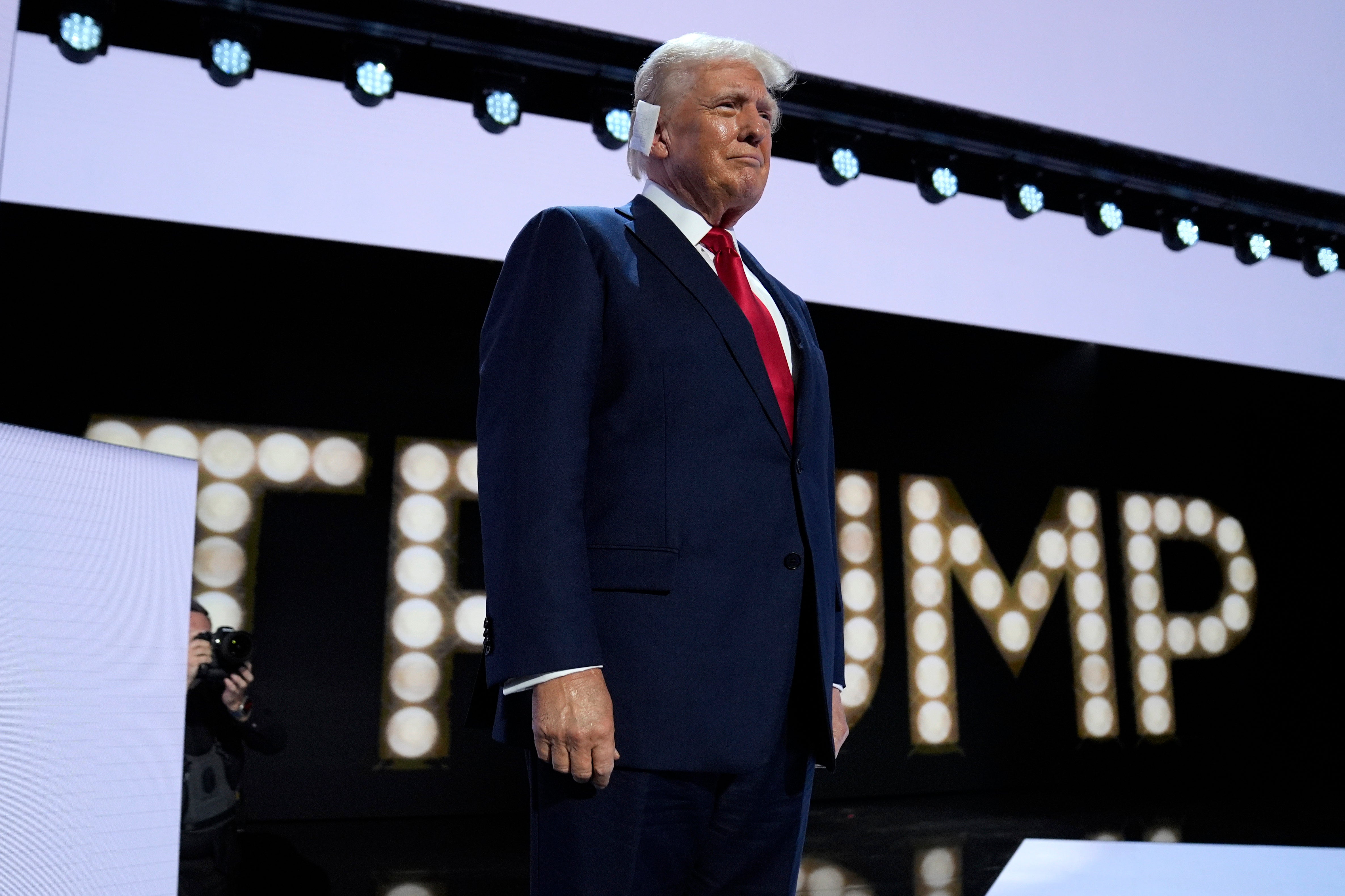 Former President Donald Trump is introduced during the final night of the Republican National Convention in Milwaukee. Singer Lee Greenwood peformed “Proud to be an American” as Trump went onstage.