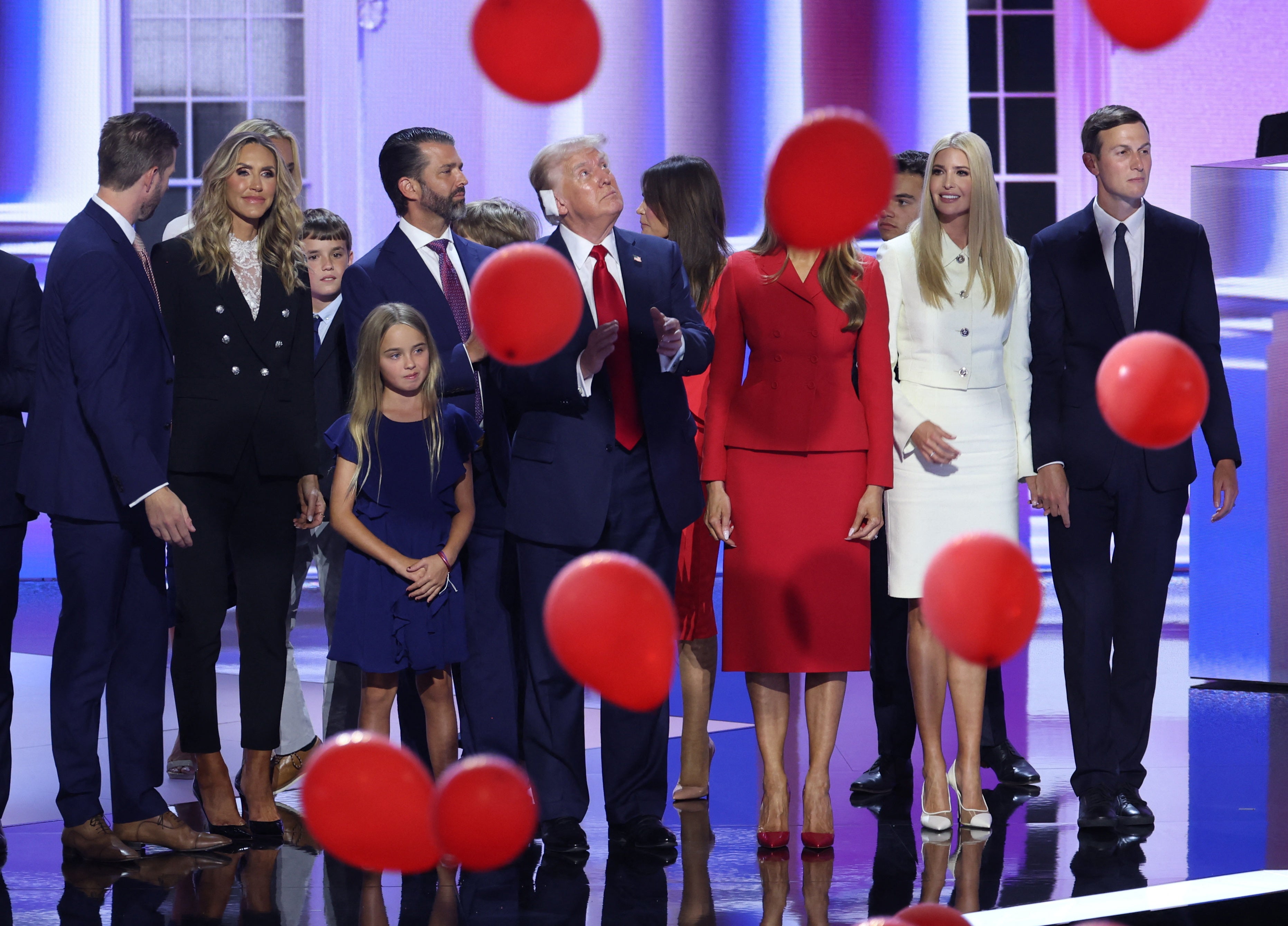 Melania Trump takes to RNC floor in rare appearance alongside family ...