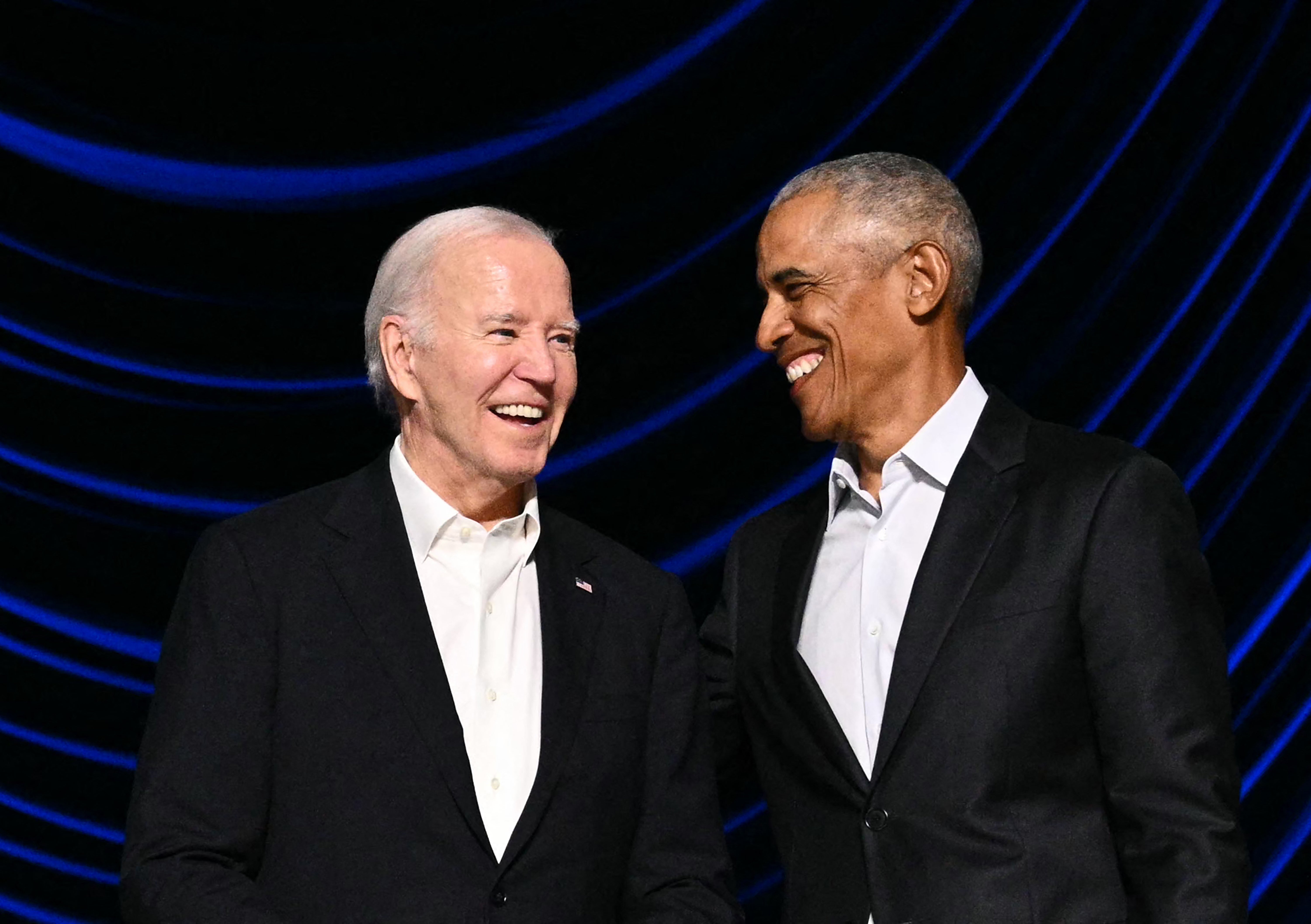 US president Joe Biden and former US president Barack Obama attend a campaign fundraiser at the Peacock Theater in Los Angeles on 15 June 2024