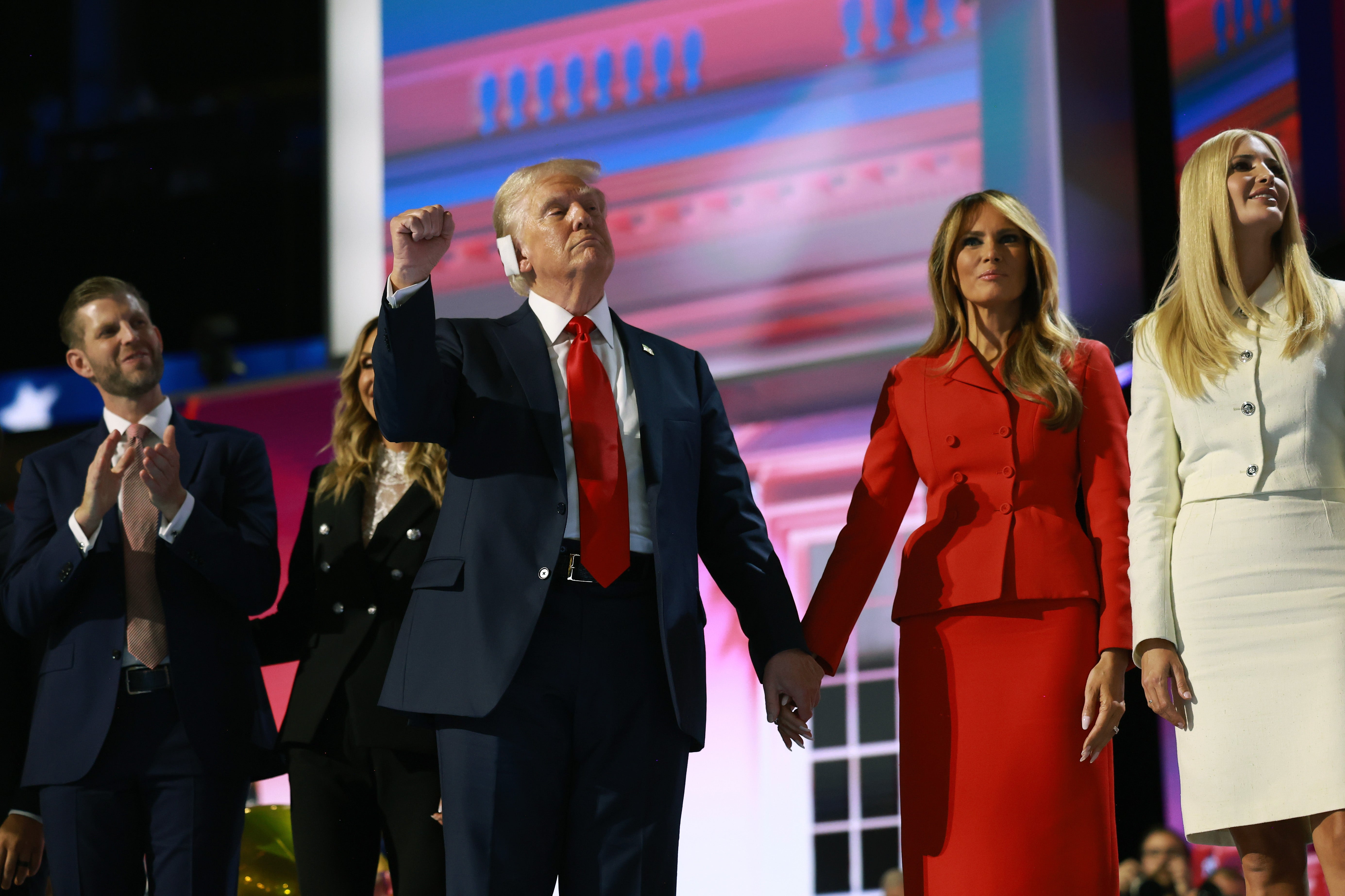 Republican presidential nominee, former US president Donald Trump and members of the Trump family celebrate after Trump officially accepted the Republican presidential nomination on the fourth day of the Republican National Convention at the Fiserv Forum on 18 July 2024 in Milwaukee, Wisconsin