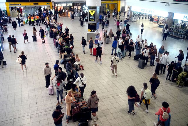 <p>Passengers in the South Terminal at Gatwick Airport in Crawley, east Sussex, amid reports of widespread IT outages affecting airlines, broadcasters and banks. Picture date: Friday July 19, 2024.</p>