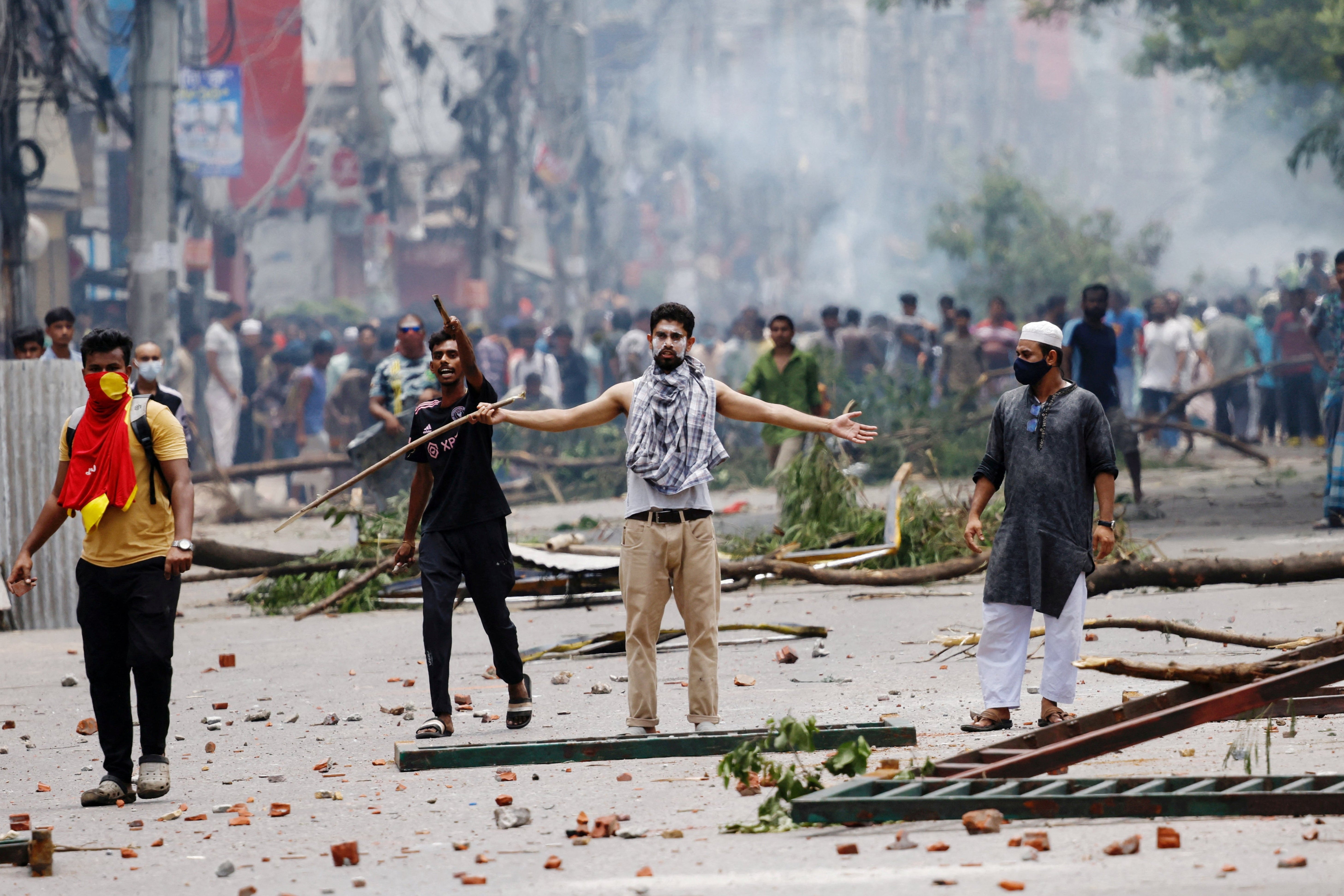 File. Protesters clash with security forces outside the Bangladesh Television headquarters on 19 July 2024