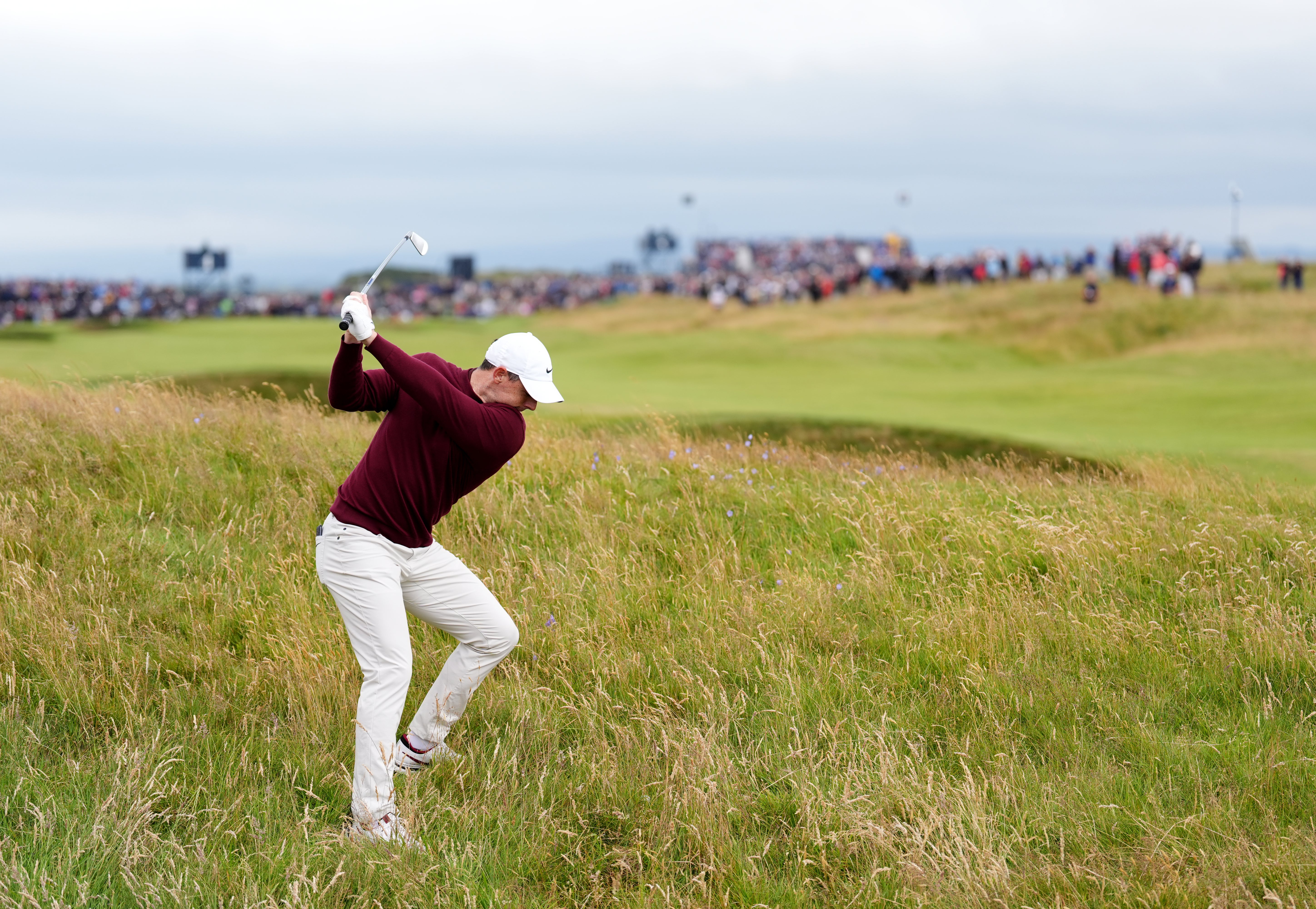 Northern Ireland’s Rory McIlroy in the rough on the 4th during day two of The Open at Royal Troon (Zac Goodwin/PA)