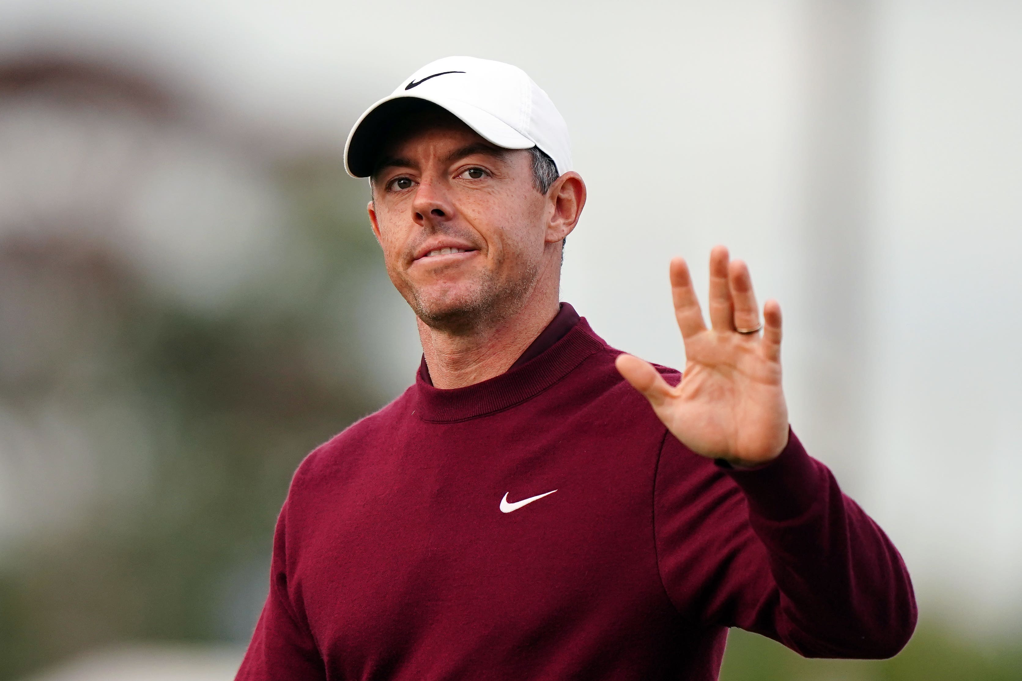 Rory McIlroy melambai ke penonton setelah gagal lolos ke Open (Zach Goodwin/PA)