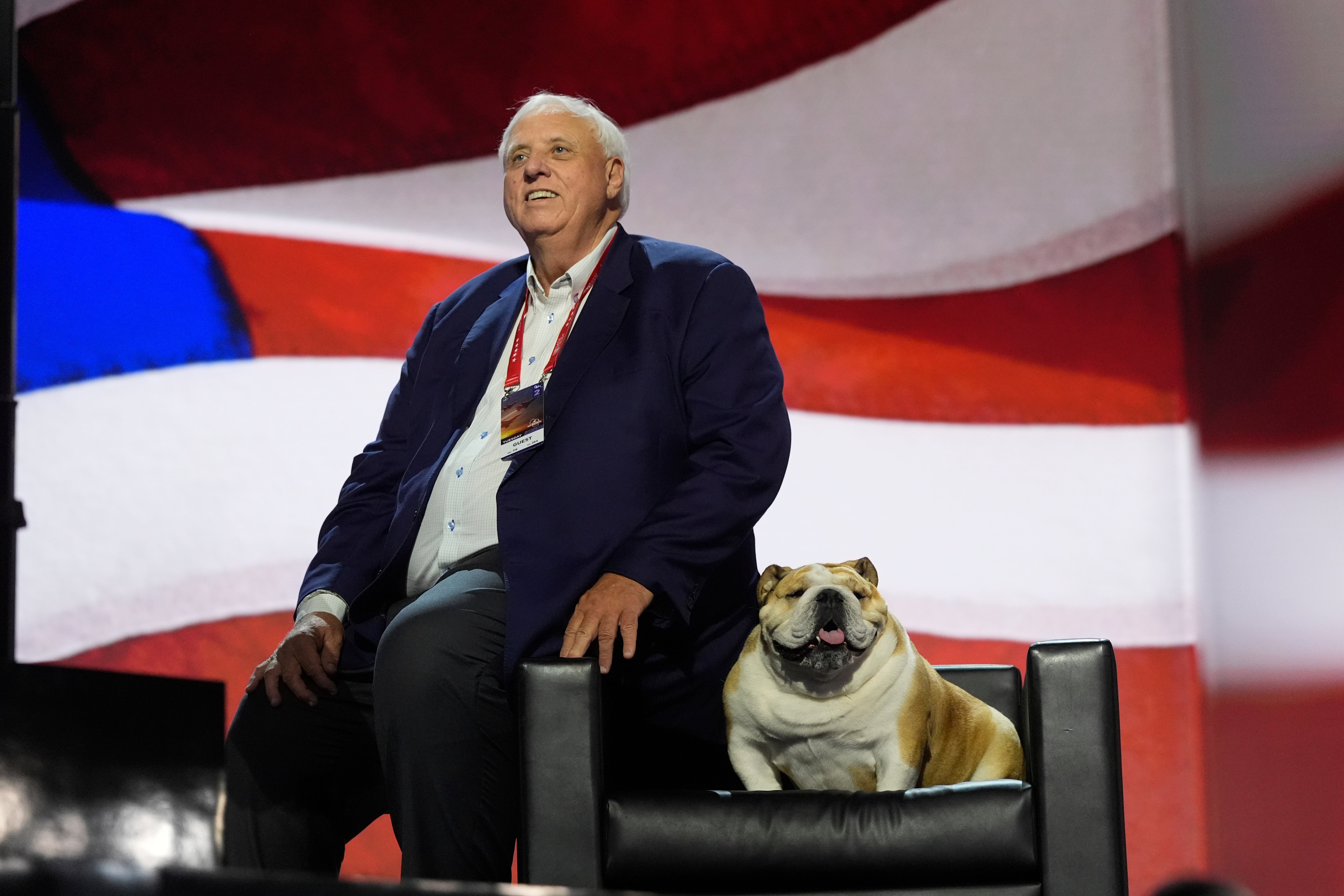 Jim Justice, accompanies by his bulldog Babydog, at the Republican National Convention in July