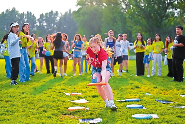 <p>Students from Tytherington School in the United Kingdom participate in a sporting event held by Beijing Language and Culture University in July </p>
