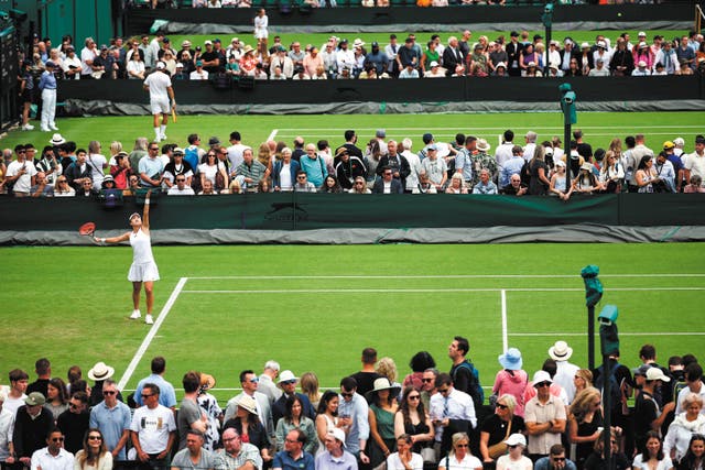 <p>China’s Zhu Lin serves to Romania’s Irina-Camelia Begu during their women’s singles tennis match at Wimbledon on 1 July</p>