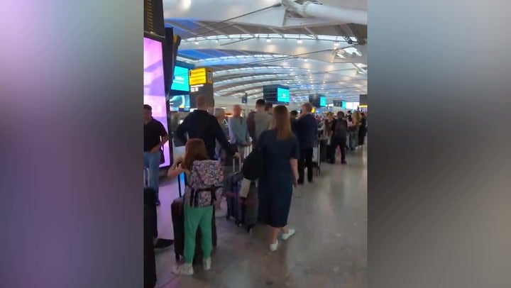 Huge queues as global IT outage causes chaos at Heathrow Airport.