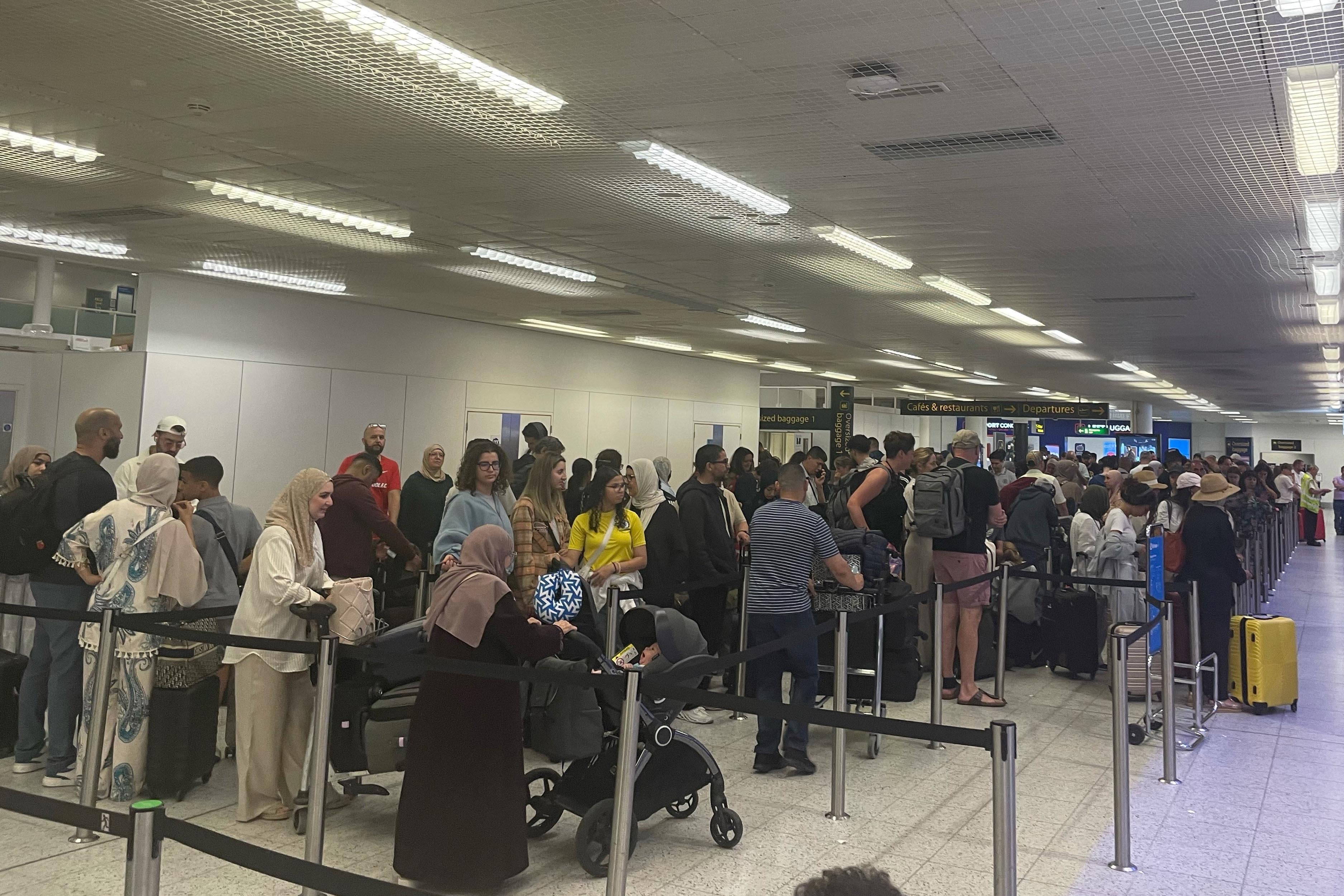 Passengers at Gatwick Airport as airlines continue to deal with the fallout from the global IT outage (Luke O’Reilly/PA)