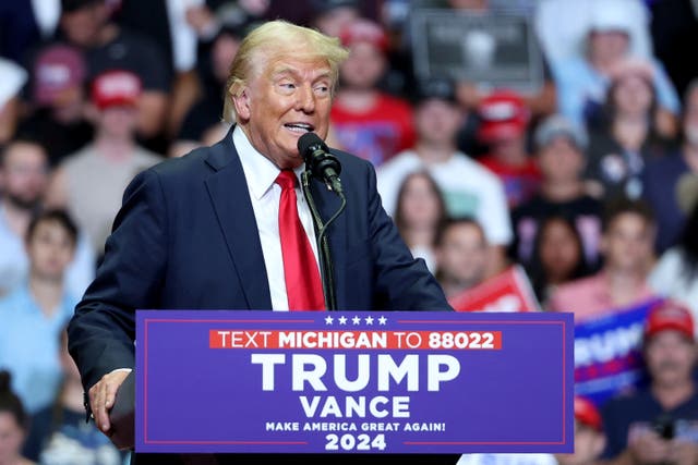 <p>Republican presidential nominee and former U.S. President Donald Trump holds a campaign rally  with his running mate, Republican vice presidential nominee U.S. Senator J.D. Vance (R-OH) in Grand Rapids, Michigan, U.S. July 20, 2024</p>