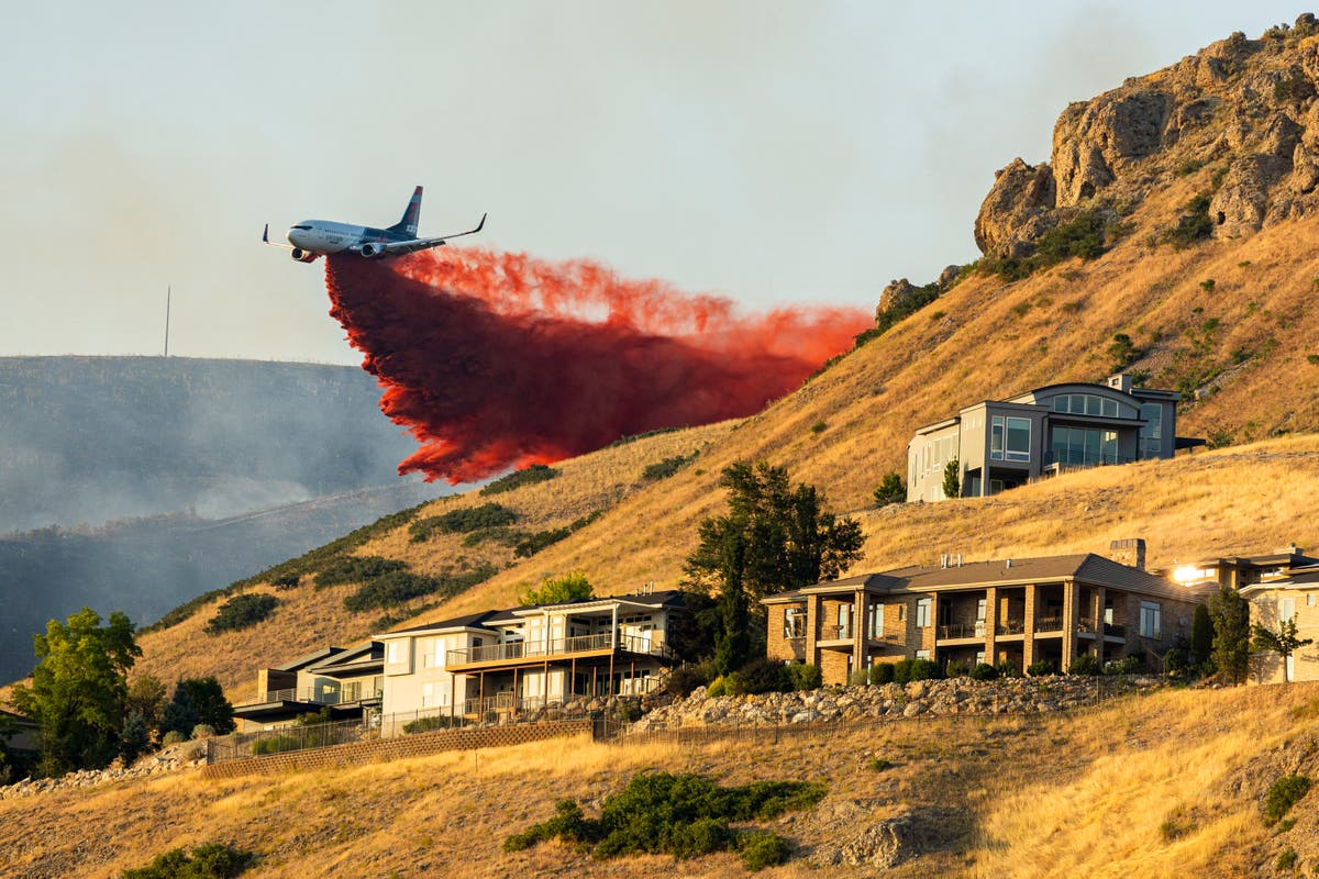 Salt Lake City wildfire prompts mandatory evacuations as more than 100 firefighters fight blaze