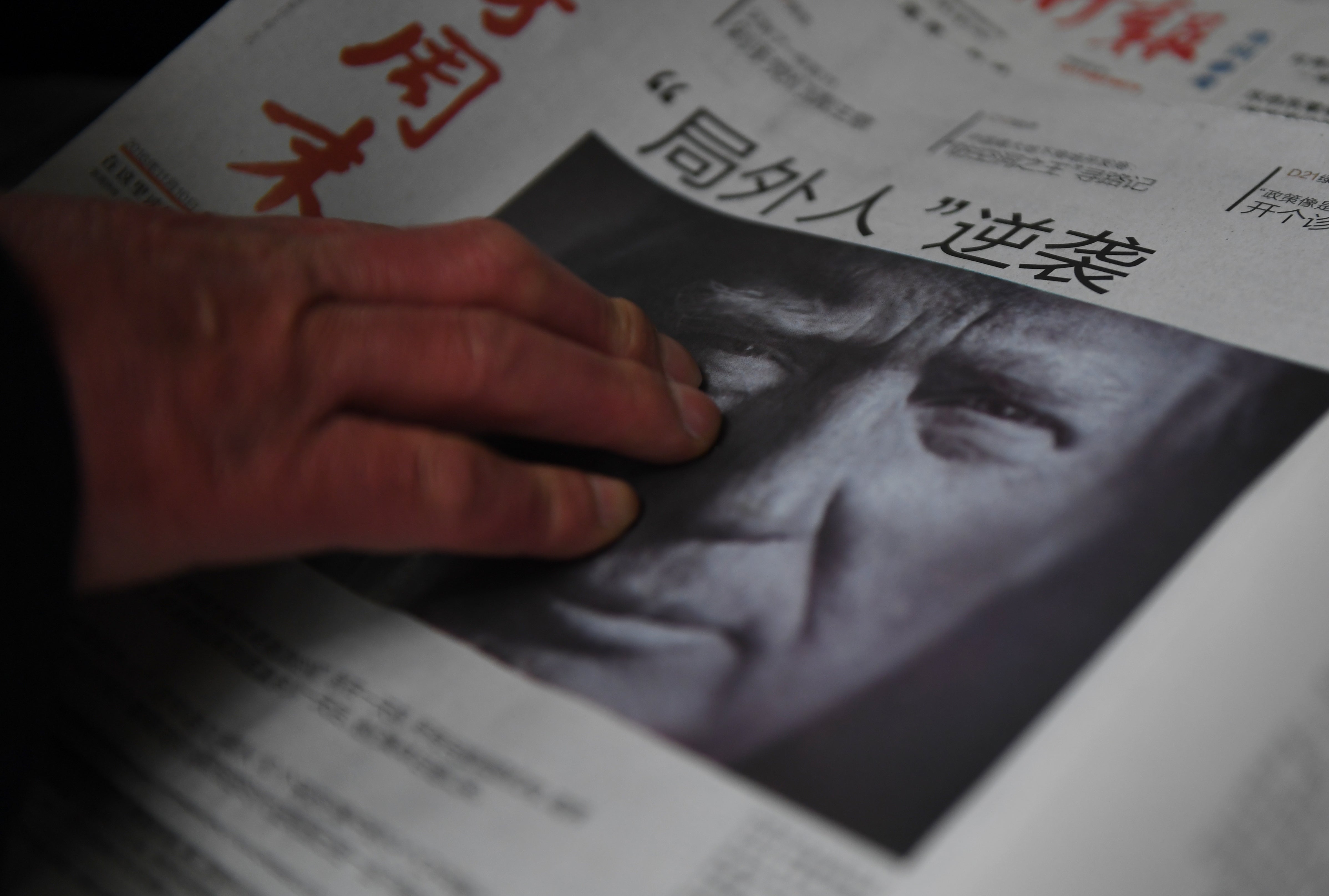 File A Chinese newspaper on sale, with the headline that reads “Outsider strikes back”, featuring Donald Trump on the front page in Beijing on 10 November, 2016