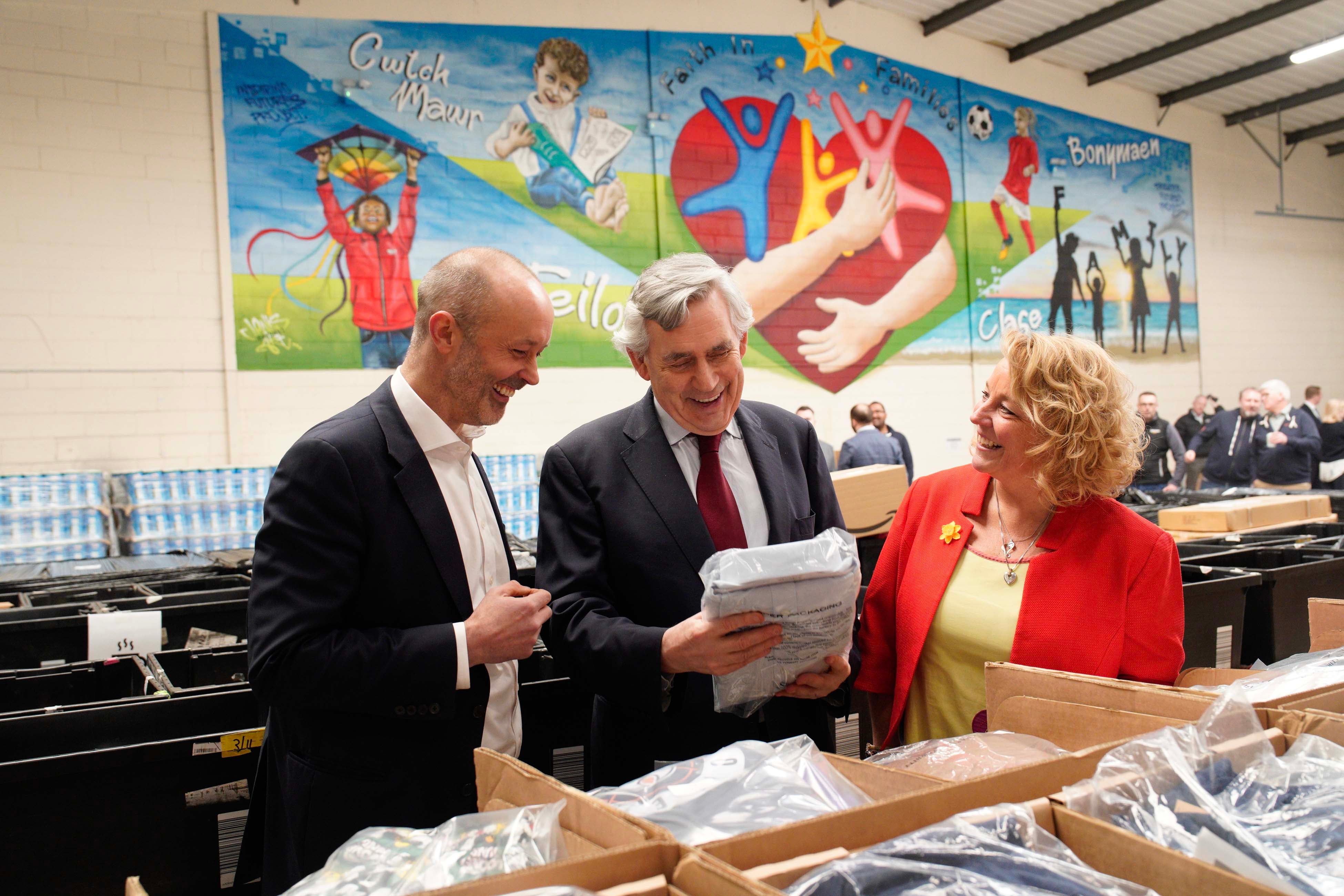 Gordon Brown (centre) at the opening of Wales’s first Multibank