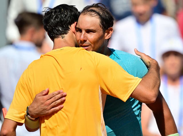 <p>Nuno Borges embraces Rafael Nadal after winning the men’s singles final</p>