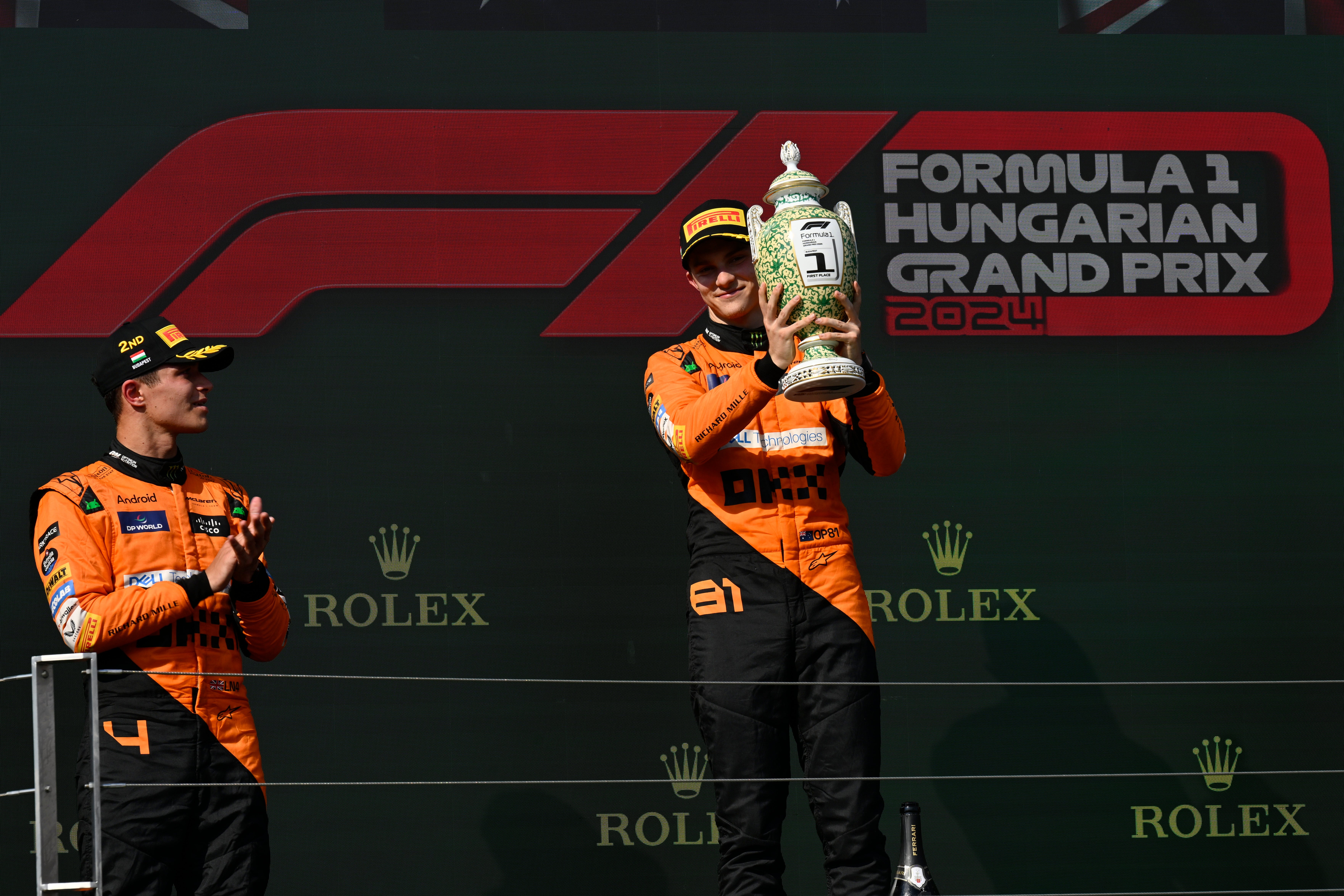 Oscar Piastri (right) celebrated on the podium with Lando Norris (Denes Erdos/AP)