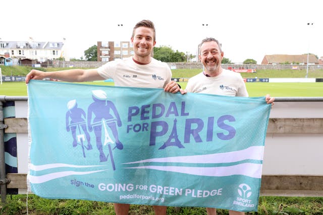 Chairman of Sport England, Chris Boardman with the PFA’s sustainability champion, David Wheeler, at Lewes Football Club (PA)