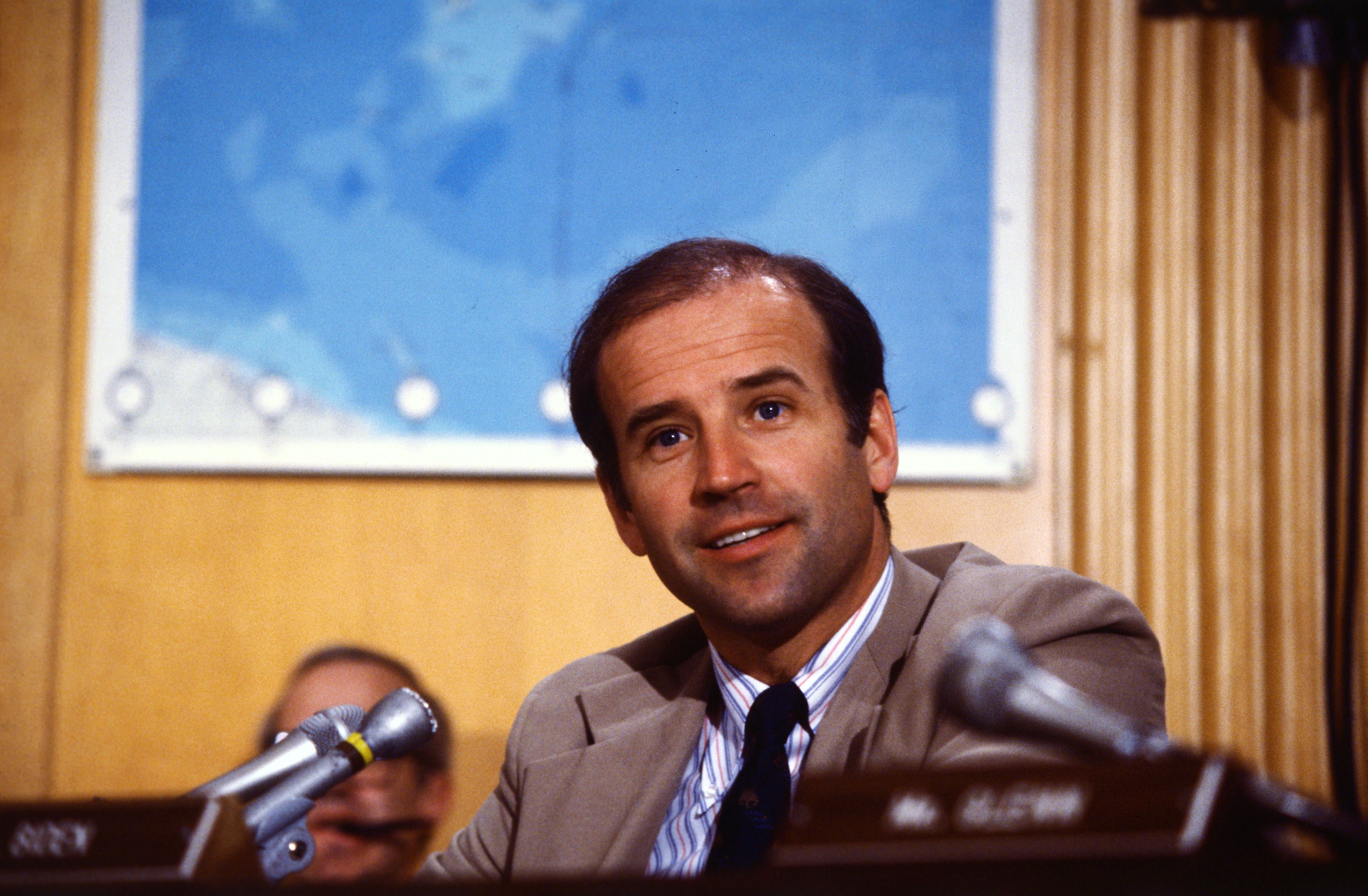 United States senator Joseph R Biden seated in the Senate Hearing room in the early years of his political career in the 1980s