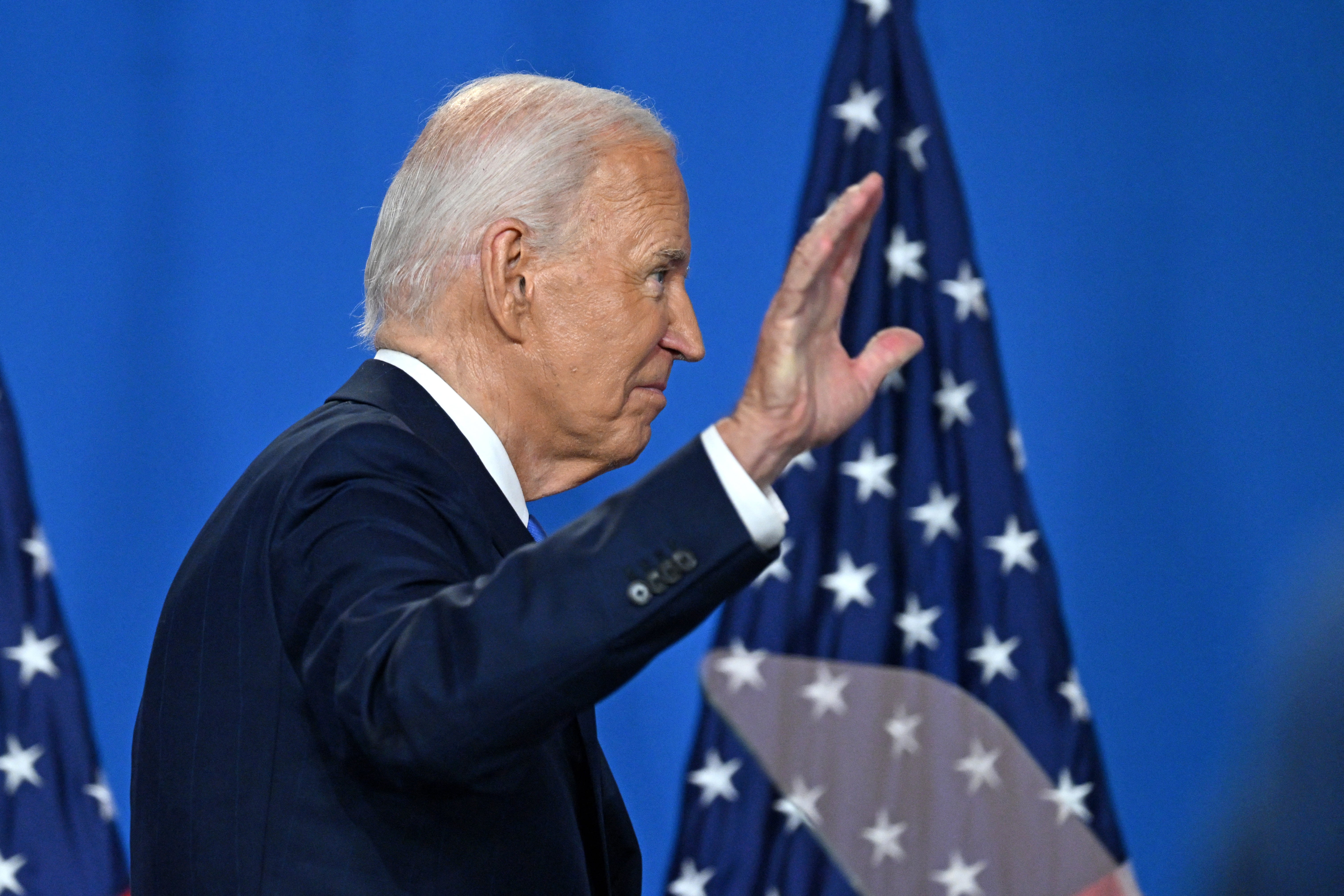 Joe Biden leaves the stage after speaking at the NATO summit in Washington DC on July 11