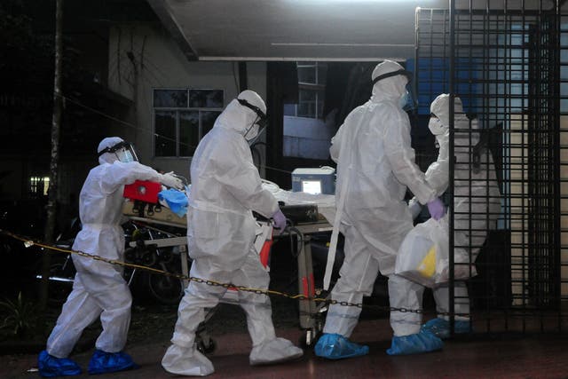 <p>A Nipah patient is moved to an isolation ward at the Kozhikode Government Medical College Hospital in Kerala</p>