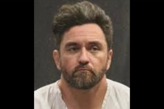 <p>William Holloway faces a murder charge after police say a woman jumped out of his car during a chase </p>