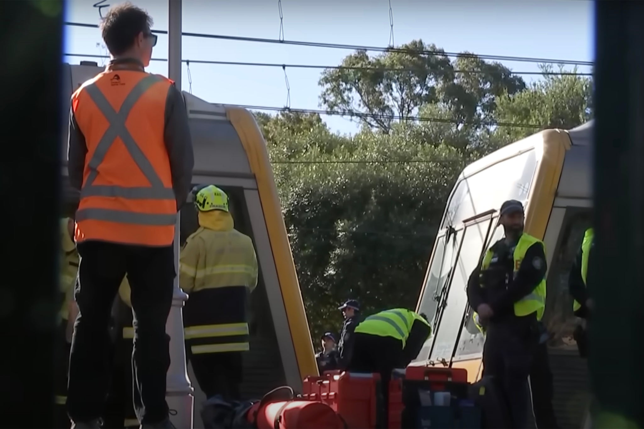 Officials at Carlton Railway Station after Anand Runwal and his daughter hit by a train