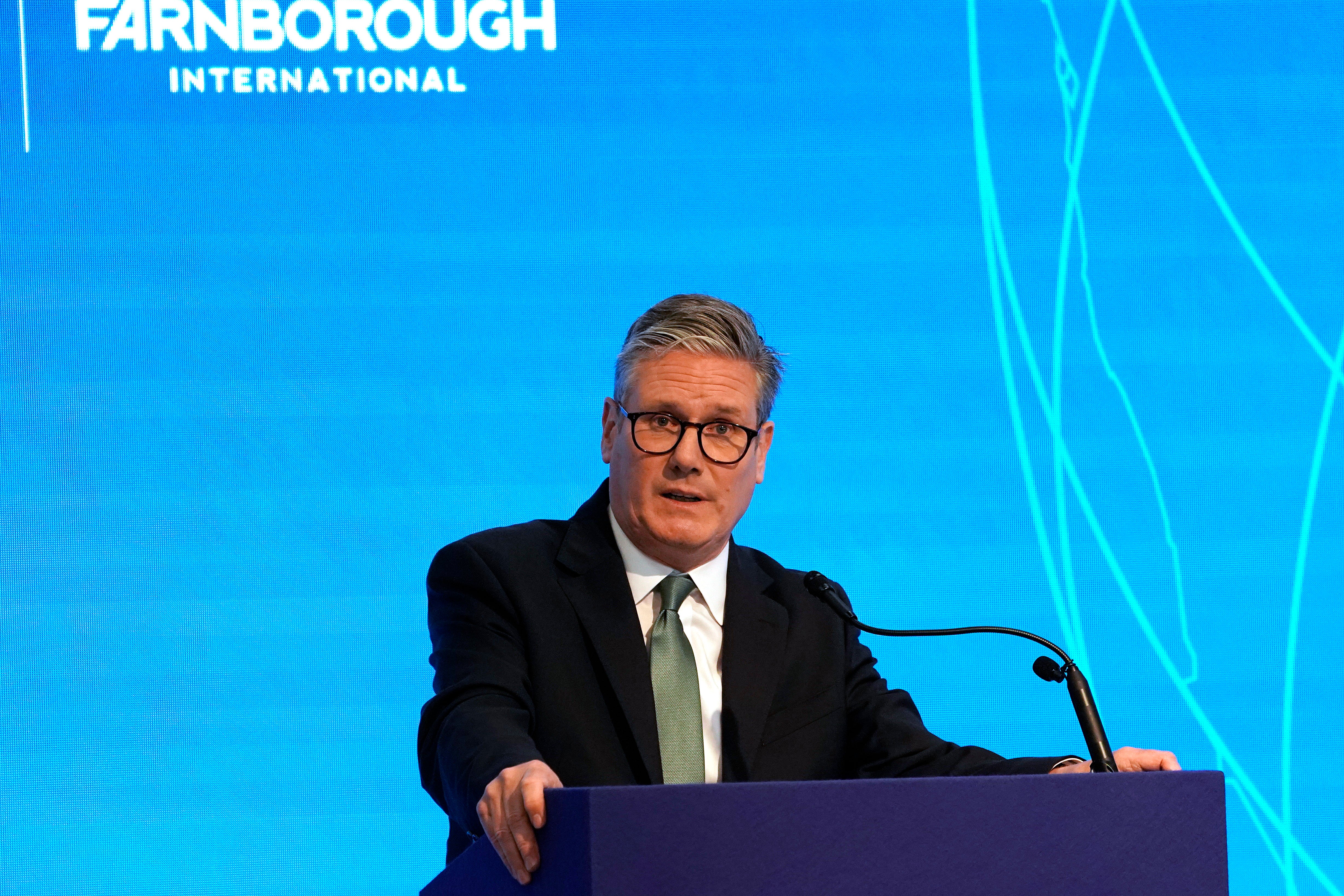 Britain's Prime Minister Keir Starmer addresses visitors to open the Farnborough International Airshow in Farnborough, England, Monday, July 22, 2024