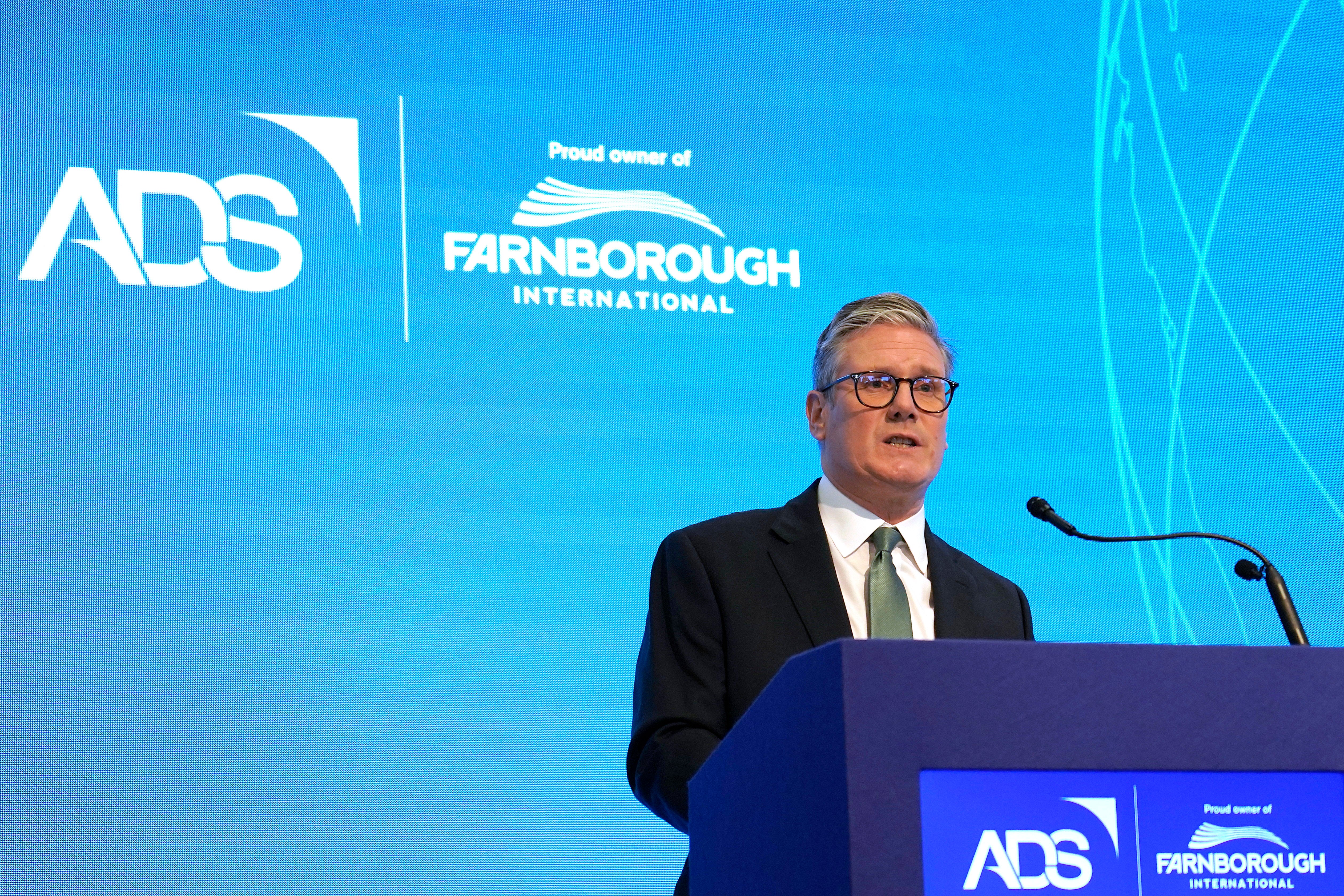 Keir Starmer addresses visitors to open the Farnborough International Airshow in Farnborough, England