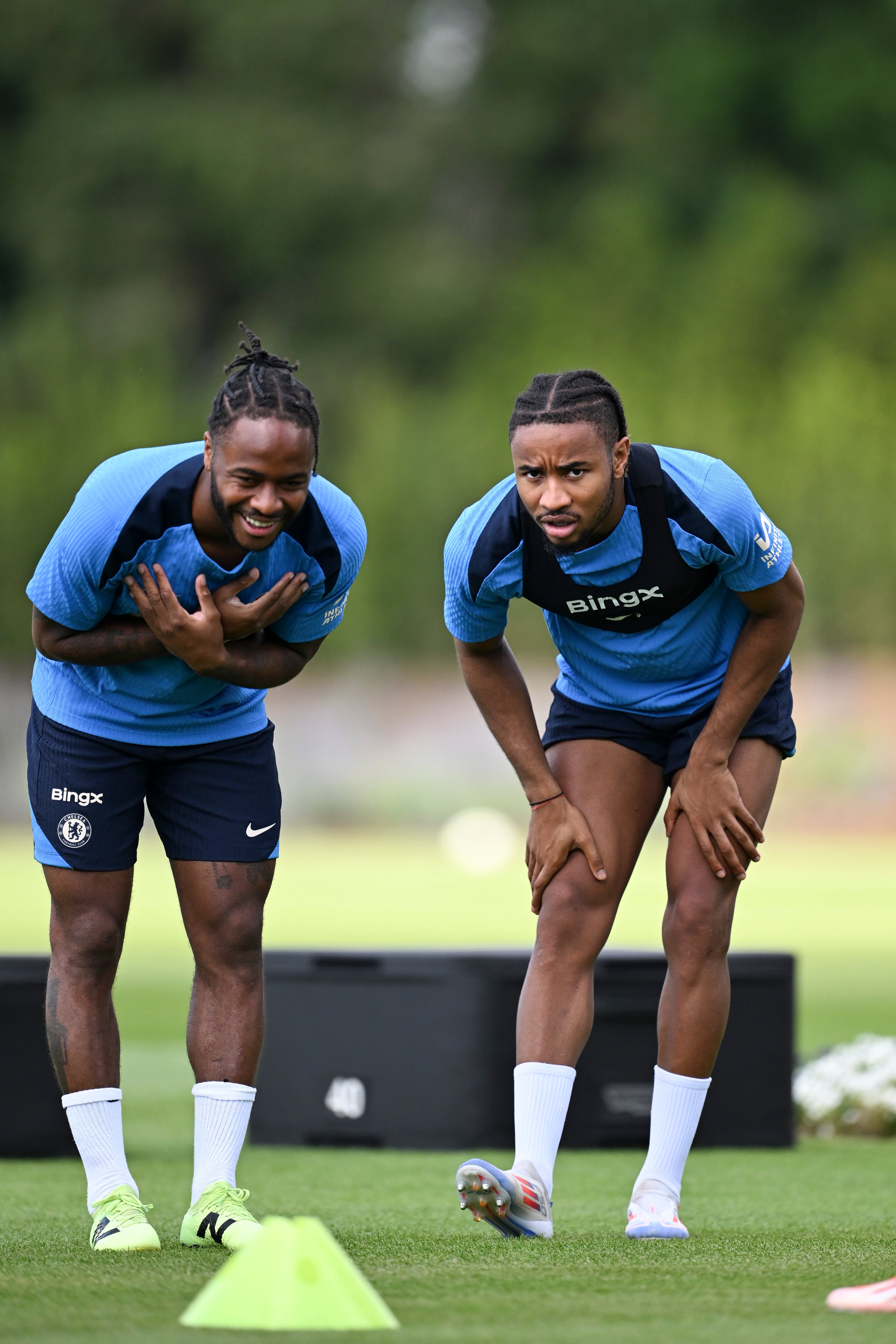 Raheem Sterling and Christopher Nkunku of Chelsea during a training session