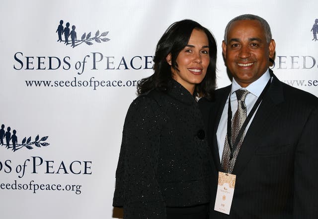 <p>Rachel Minaya (left) and her husback Omar Minaya (right) pictured in New York City in 2008.  Rachel was found dead in their home at the weekend </p>