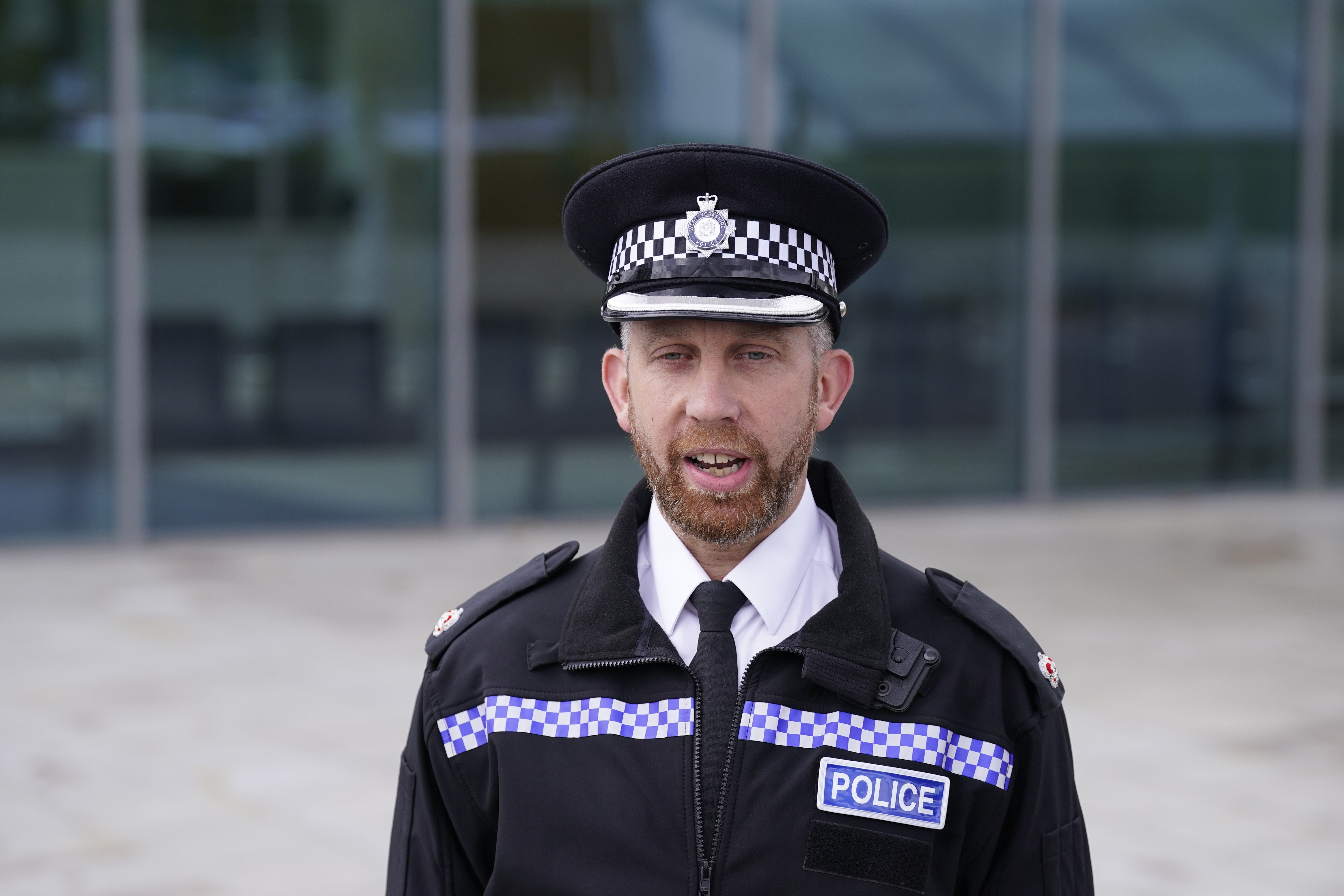 Superintendent Alan Travis, Wakefield District Police, makes a statement outside Wakefield District Police headquarters in Normanton on Monday