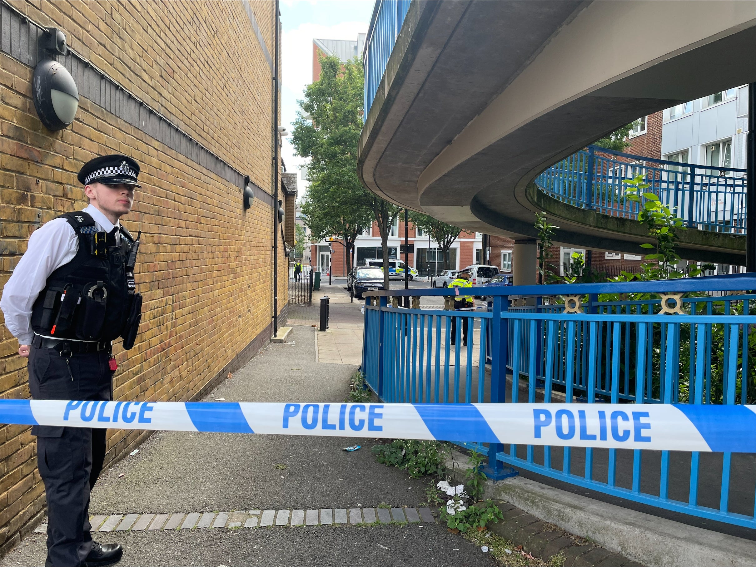 Police tape cordoning off the area near Emslie Horniman's Pleasance Park, near Ladbroke Grove