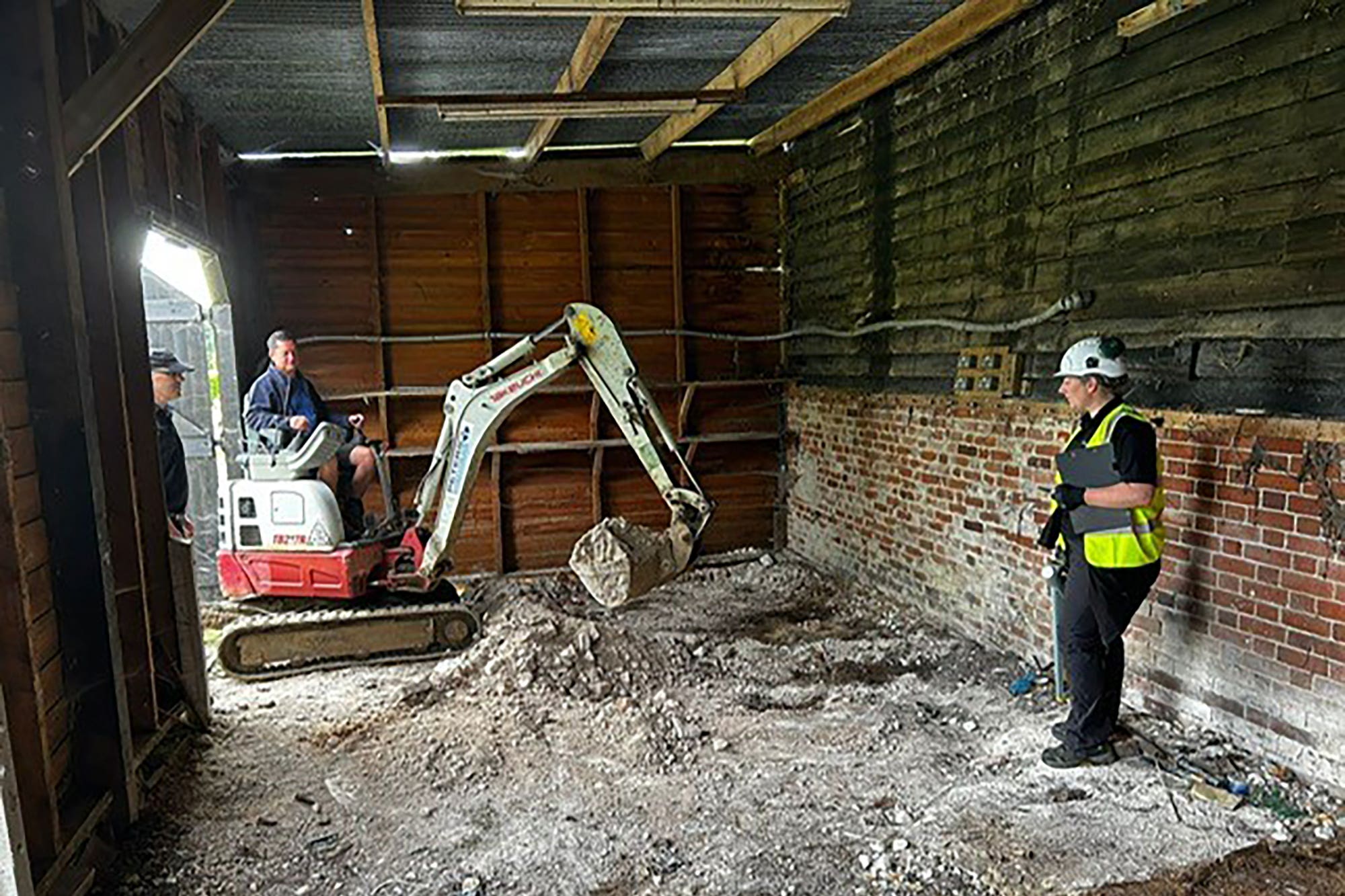 Undated Metropolitan Police handout photo of police officers searching inside a barn at a Hertfordshire farm for the remains of Muriel McKay (Metropolitan Police/PA)