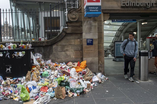 Unions warned Scotland could face a ‘stinking summer’ if a pay dispute with council workers results in waste, street cleaning and recycling staff going on strike. (Lesley Martin/PA)