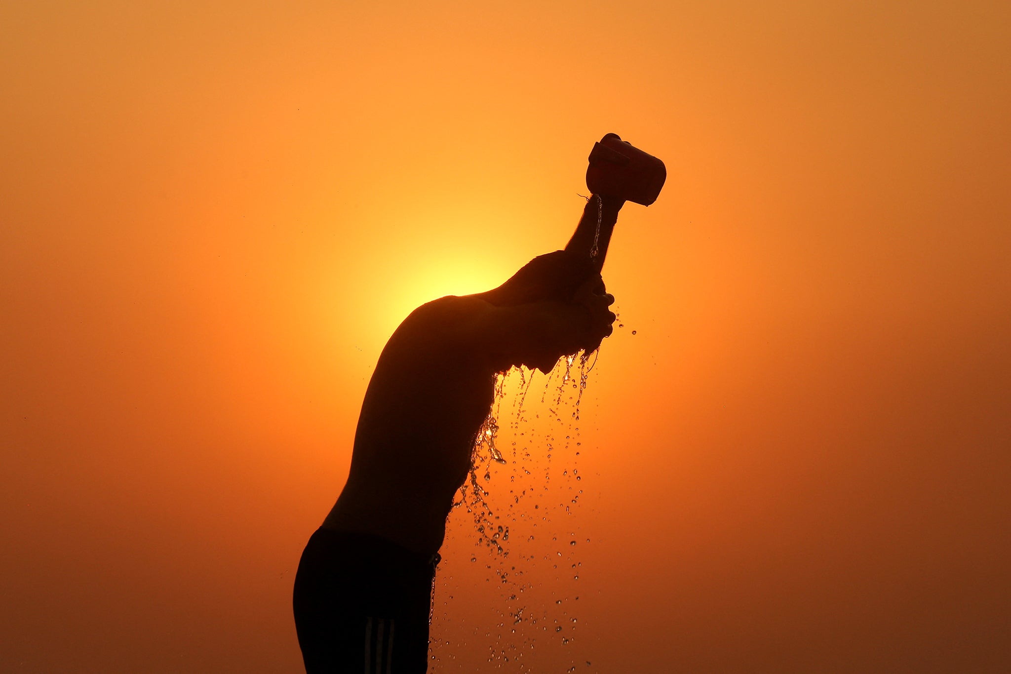 A labourer works in an intense heatwave in Jammu this summer