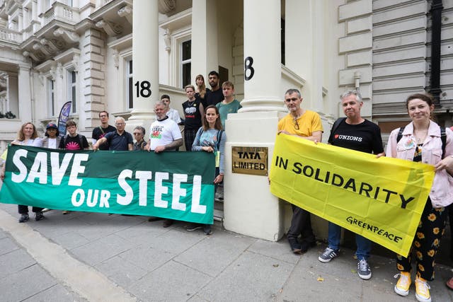 Protesters gathered outside the firm’s London headquarters on Monday (Kristian Buus/Greenpeace/PA)