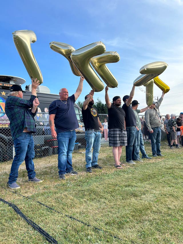 <p>The ‘Lucky 7’ fishermen pictured at a parade after they were rescued from a life-raft drifting in the Atlantic Ocean</p>