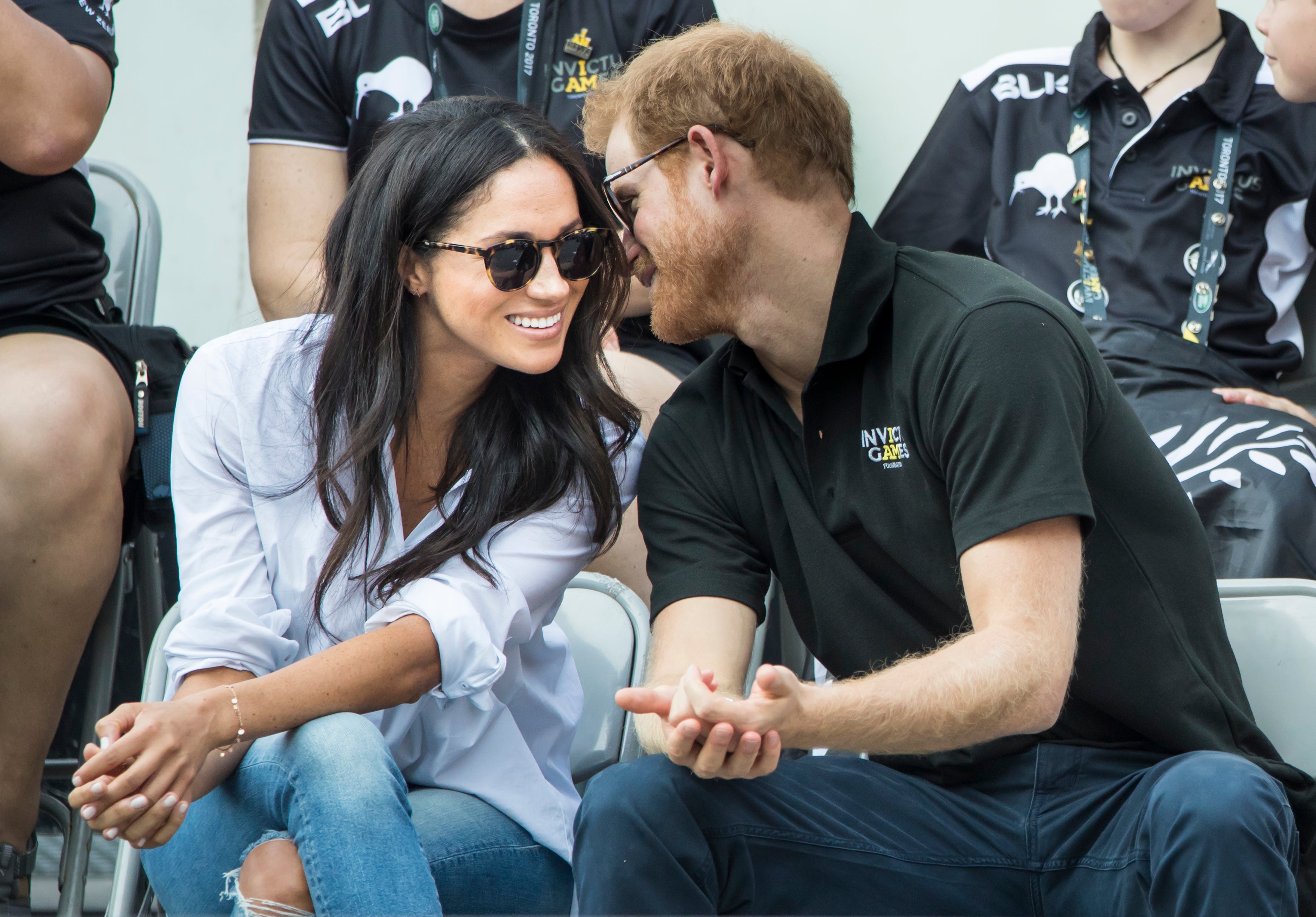 Harry and Meghan at the wheelchair tennis in Toronto, Canada, in 2017 (Danny Lawson/PA)