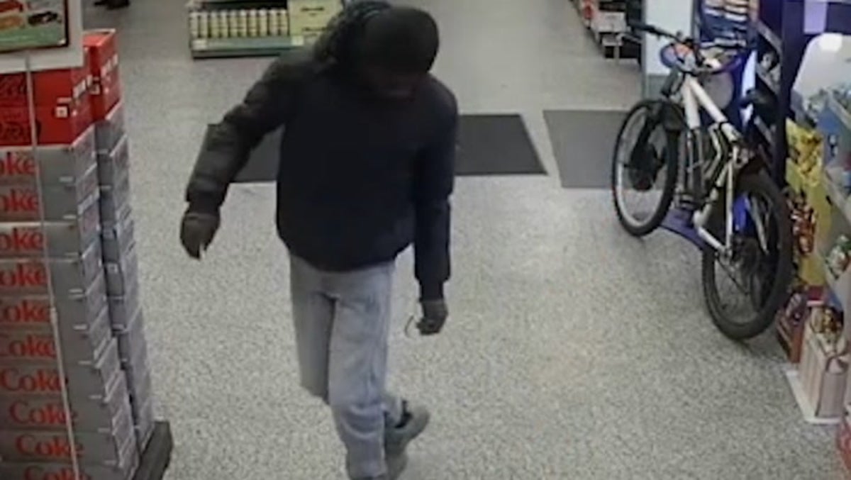 Moment clumsy thug flees shop after dropping knife in front of staff