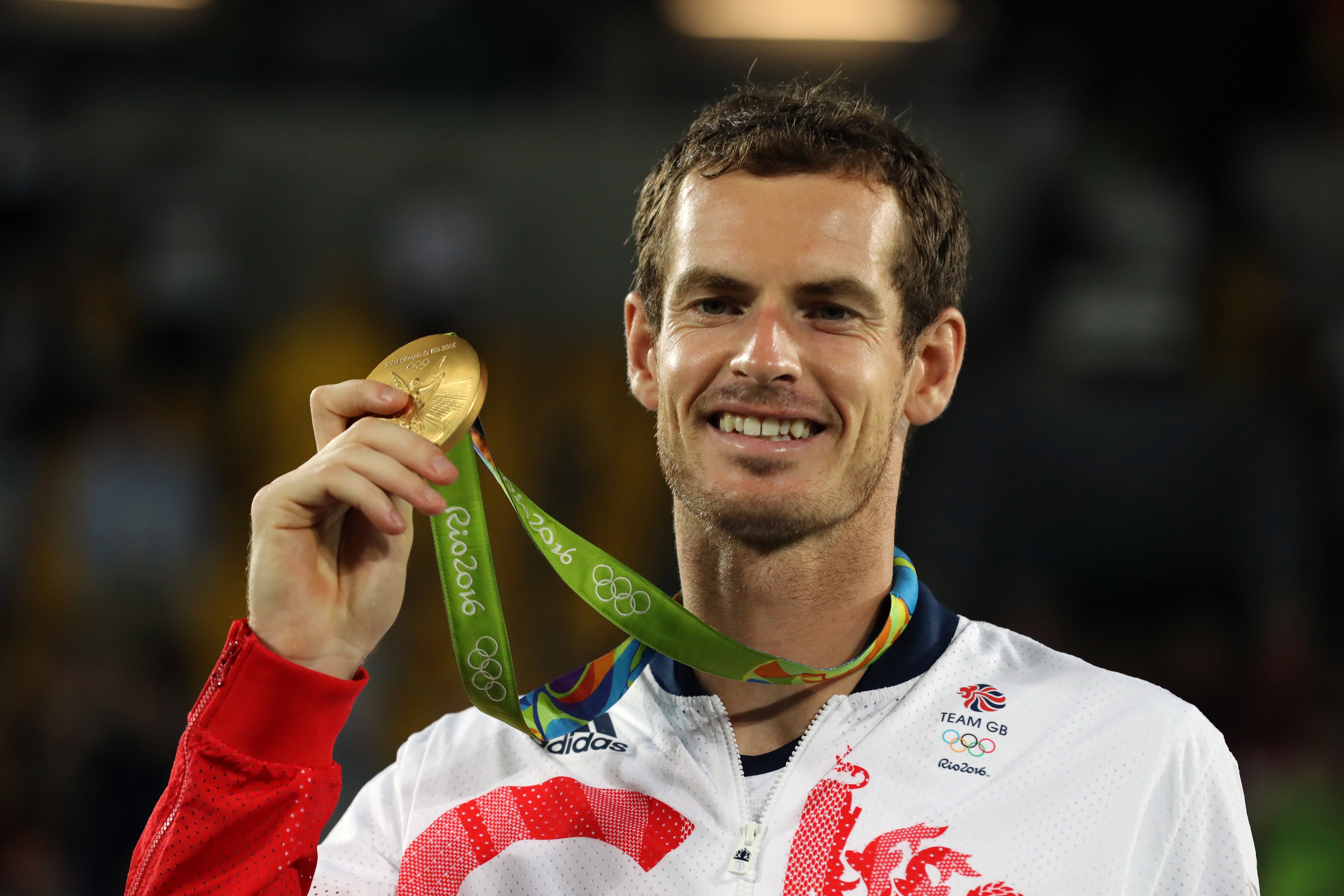 Great Britain’s Andy Murray with his gold medal following victory in the men’s singles final at the Olympic Tennis Centre in Rio (Owen Humphreys/PA)