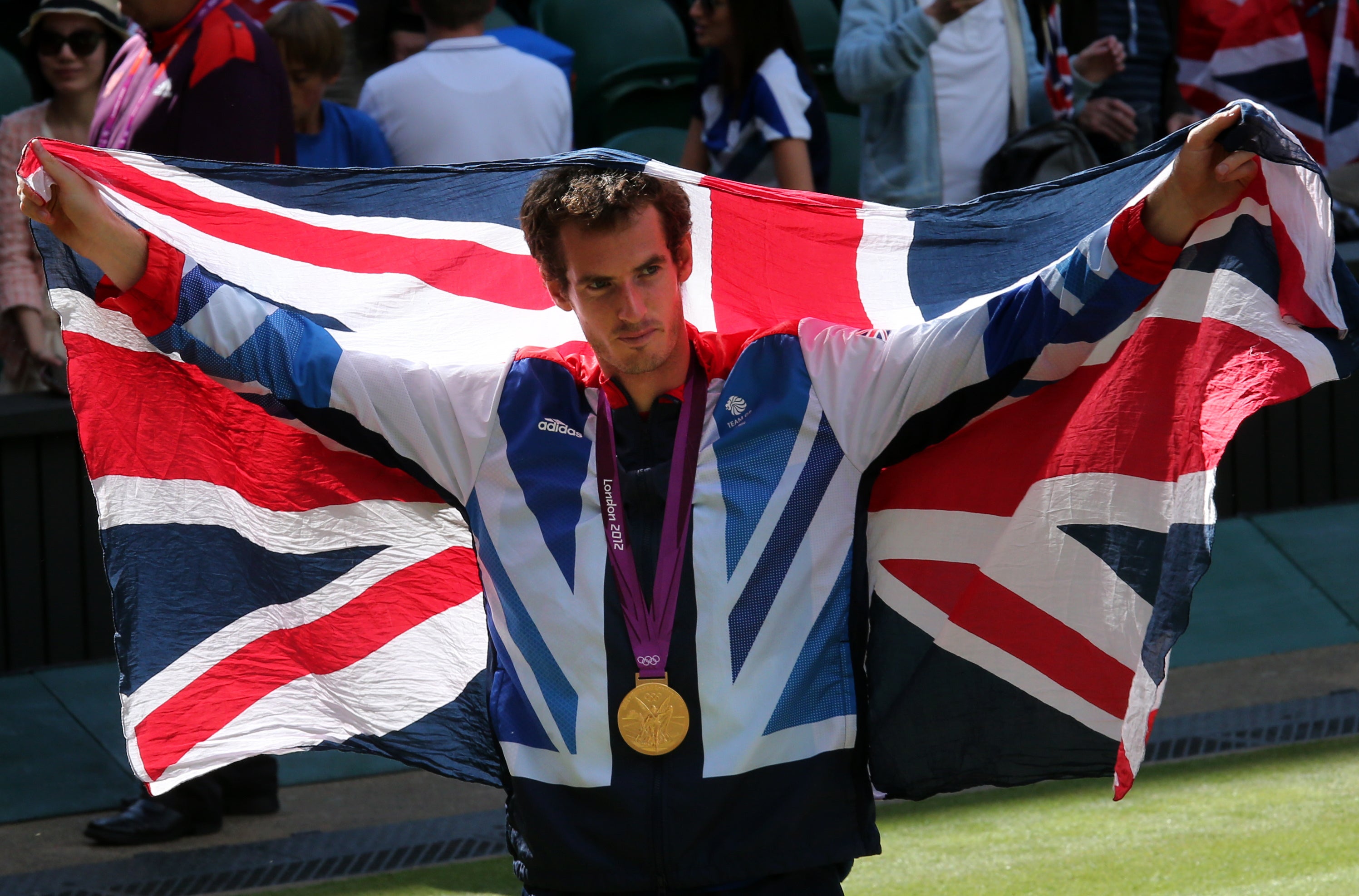 Murray with his gold medal after beating Roger Federer (Andrew Milligan/PA)