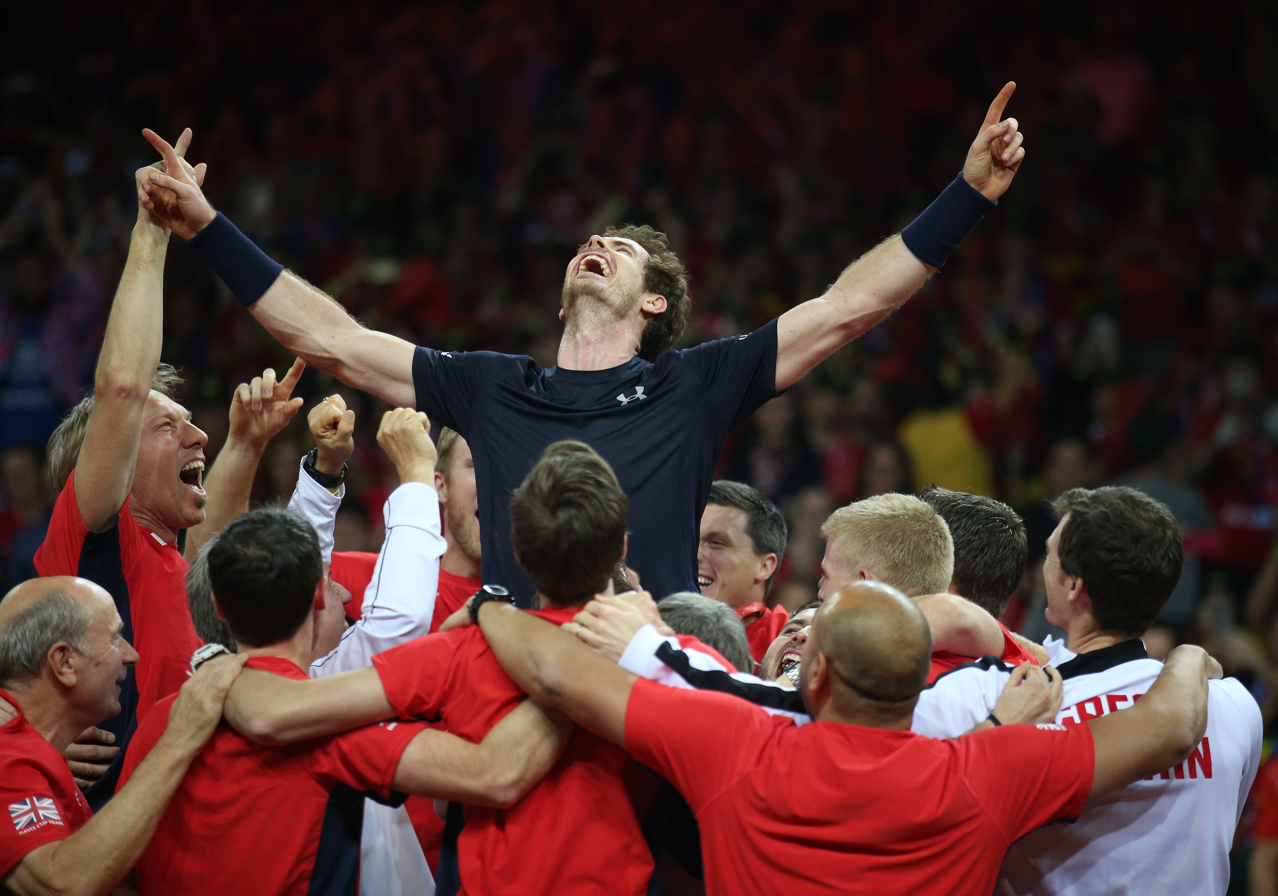 Murray is held aloft by team-mates as they celebrate winning the Davis Cup (Andrew Milligan/PA)