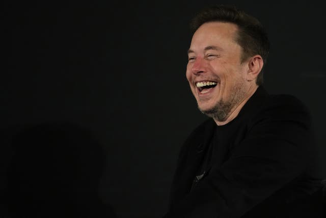 Elon Musk’s firm Tesla has been developing robots (PA)