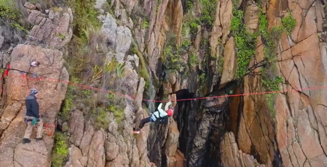 A grab from the trailer of ‘Race to Survive’ shows contestants undertaking extreme activities in the wild in New Zealand