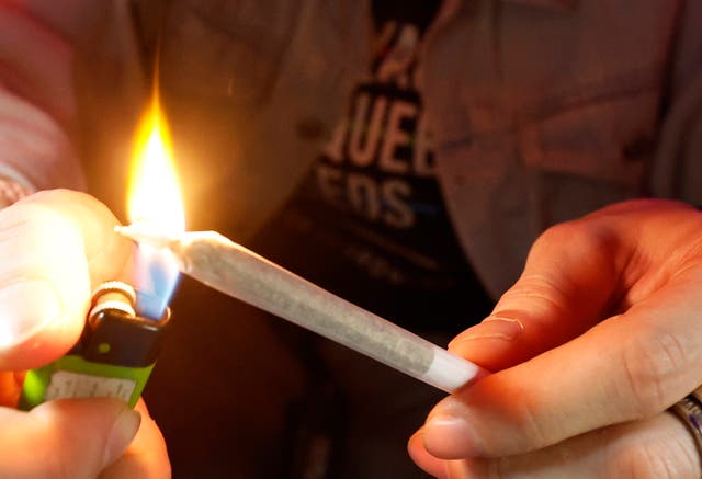 <p>A consumer in the smoking lounge at Royal Queen Seeds cannabis store in Bangkok, Thailand, 16 July 2024</p>