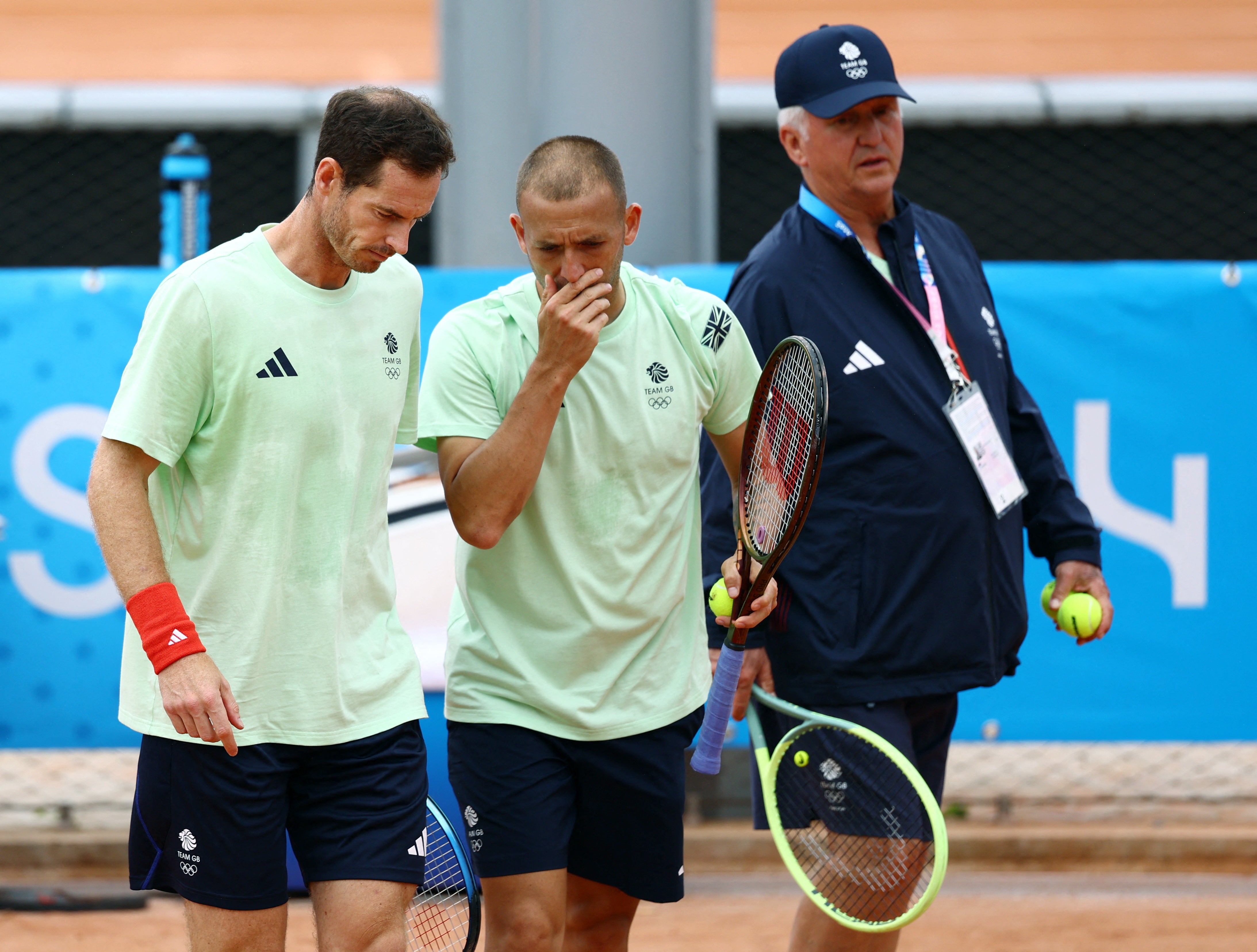 Andy Murray with British teammate Dan Evans in practice on Tuesday